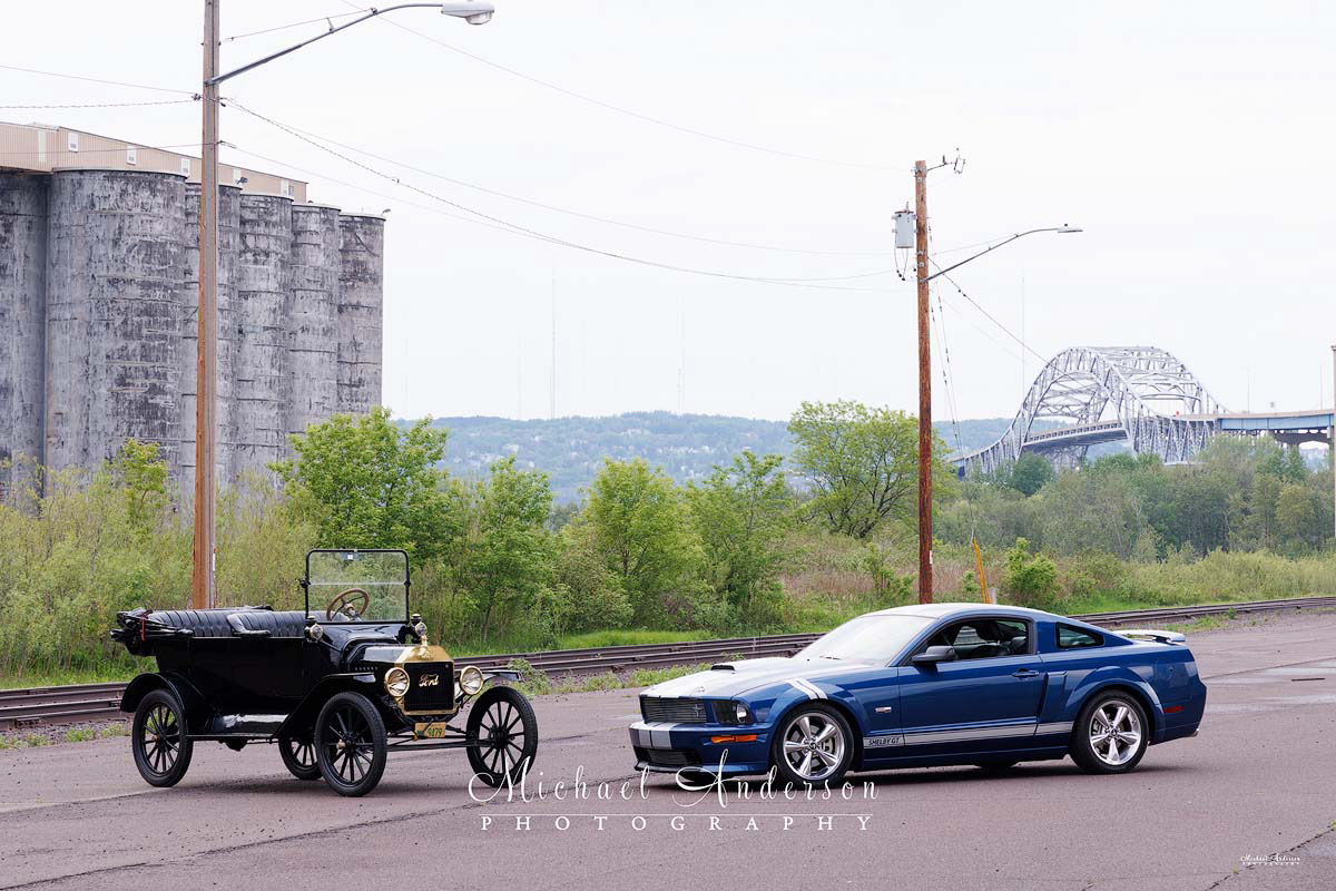 Photograph of a 1915 Ford Model T and a 2008 Ford Shelby Mustang prior to light painting them in Superior, Wisconsin.