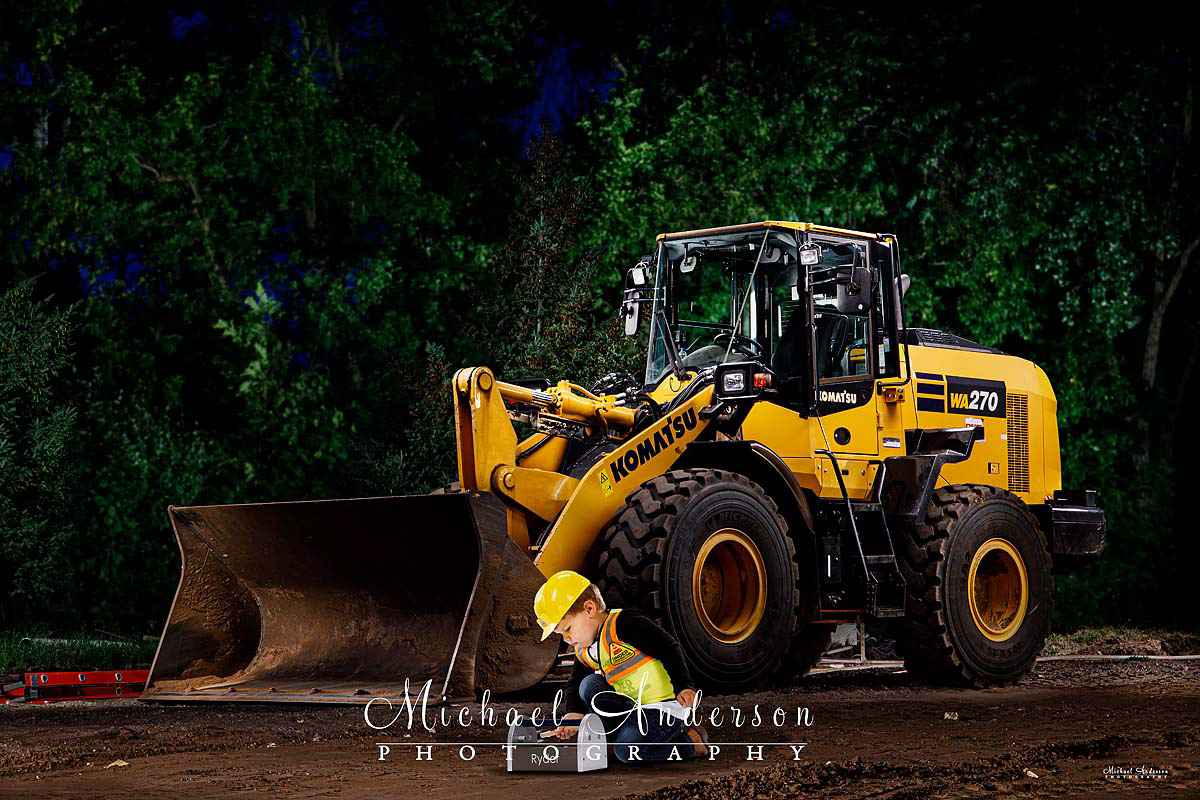 A cool light painted photo of a little boy (he was added in post) and a Komatsu WA270-8 Front Loader.