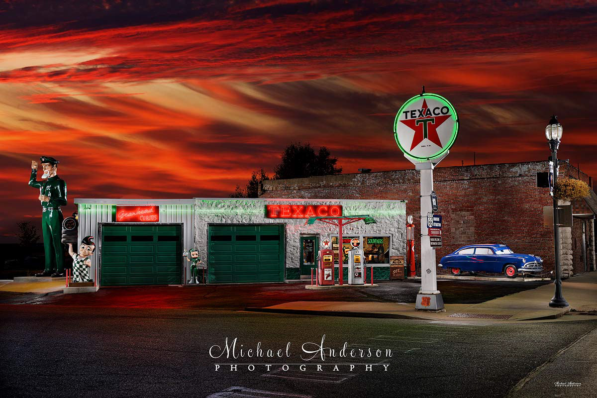 A cool light painted photograph of "Gearhead Curios" and the Vintage Texaco Station on Route 66 in Galena, Kansas.