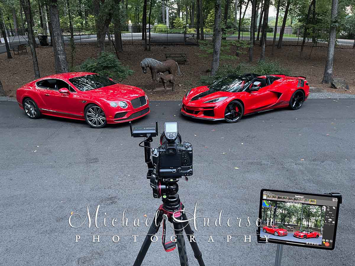 Behind-the-scenes look at the light painting set up for a Bently and a Corvette E-Ray as seen from the camera's perspective. 