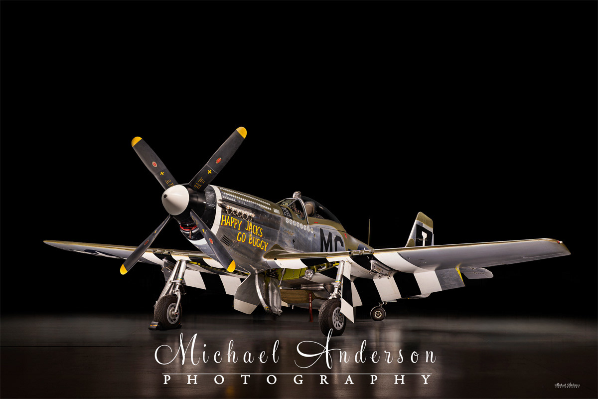 A stunning light-painted photograph of the famous P-51D Mustang fighter "Happy Jack's Go Buggy".