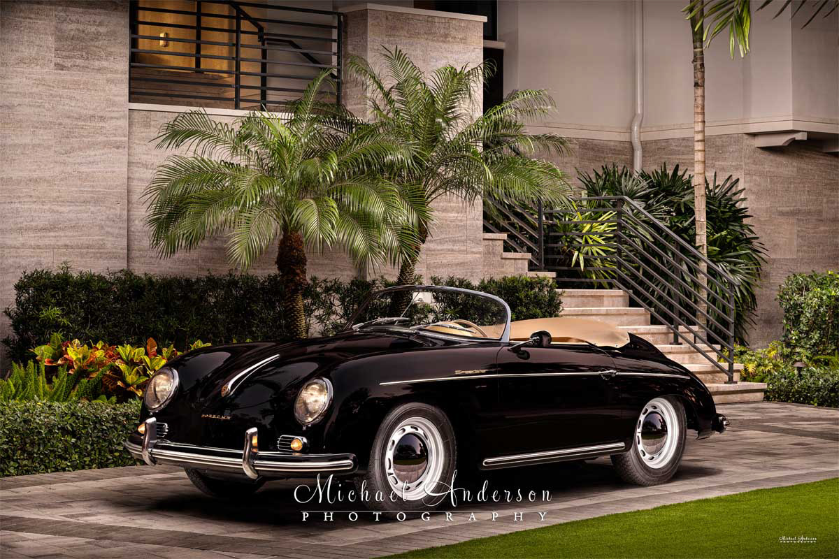 A stunning light painted photograph of a black 1958 Porsche 356A 1600 Speedster.