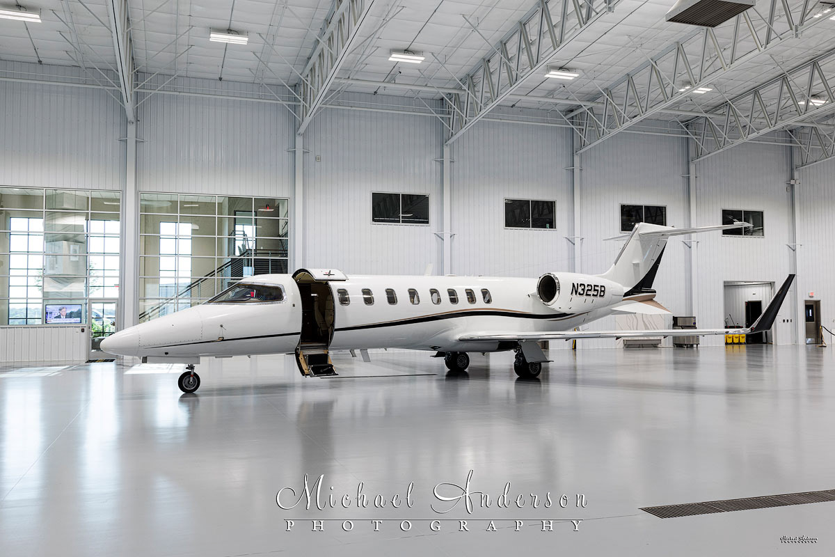 A Learjet 45XR in a hangar prior to light painting the aircraft.