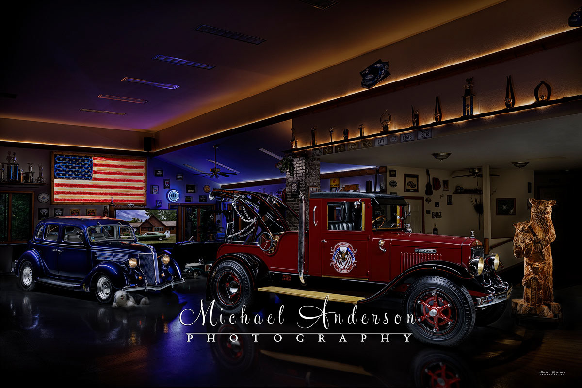 A cool light painting of a 1927 International Wrecker and a beautiful 1936 Ford Sedan in a Man Cave.