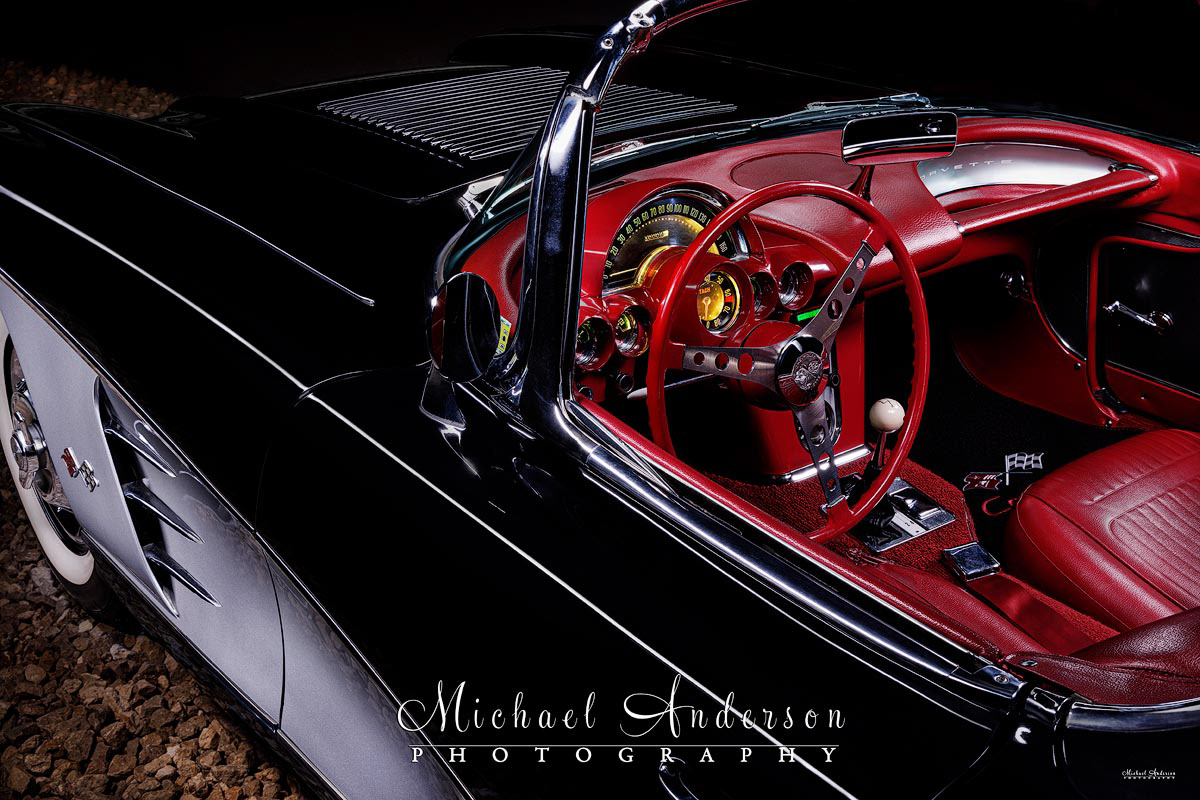 A cool light painted photo of the Cove and interior of a beautiful black and silver 1958 C1 Corvette.