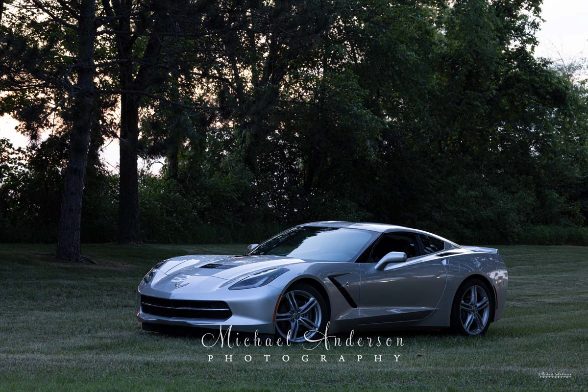 A 2017 Chevrolet Corvette, in a park, waiting to be light painted.
