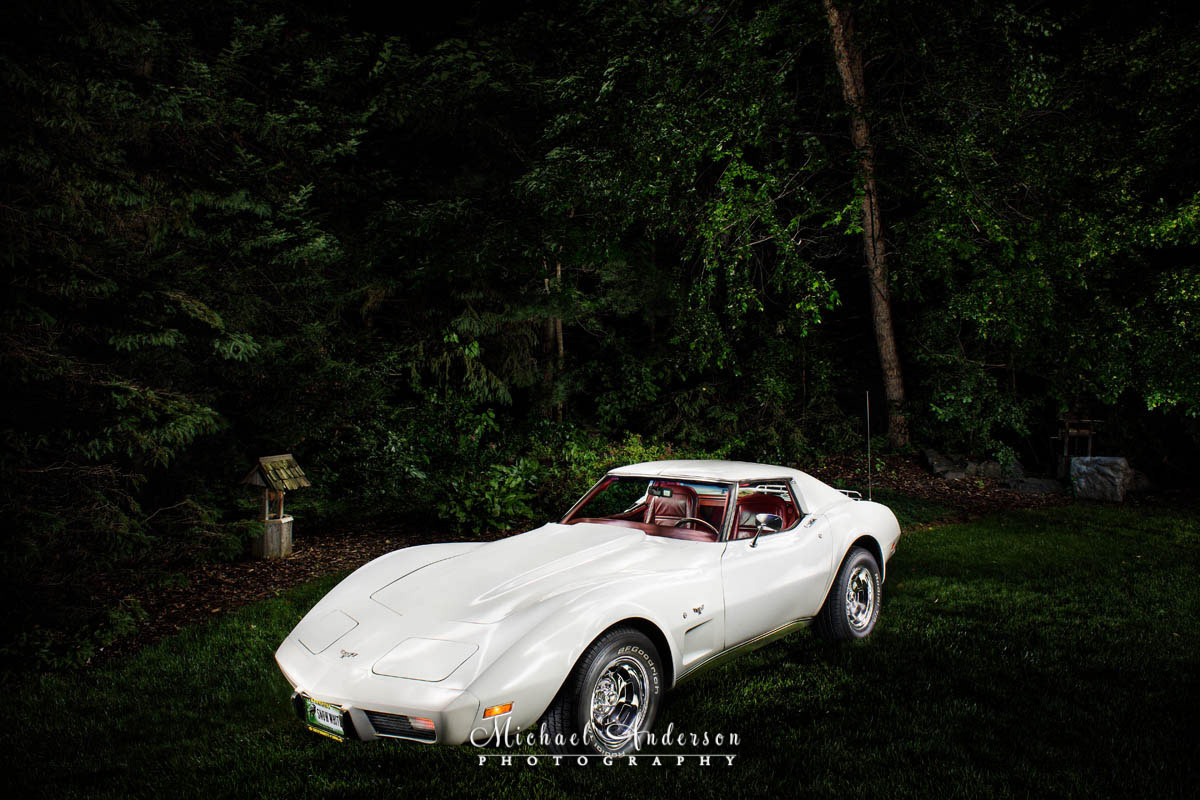 Light painted photograph of a 1977 Classic White Corvette.