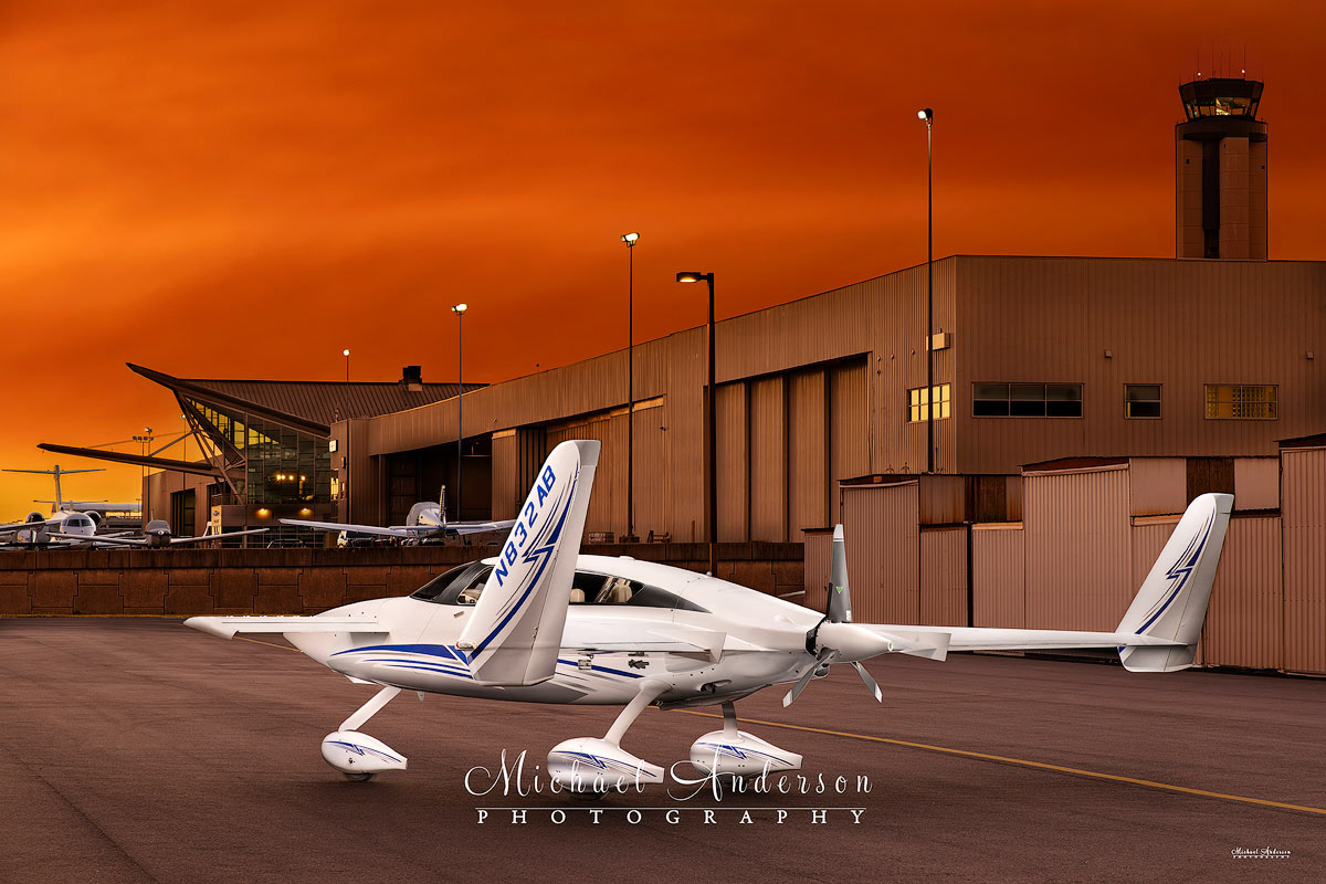 A pretty light painted photograph of the rear view of the 2000 Velocity Experimental Aircraft NB32AB. Image was created at Raleigh-Durham International Airport in Raleigh, North Carolina.