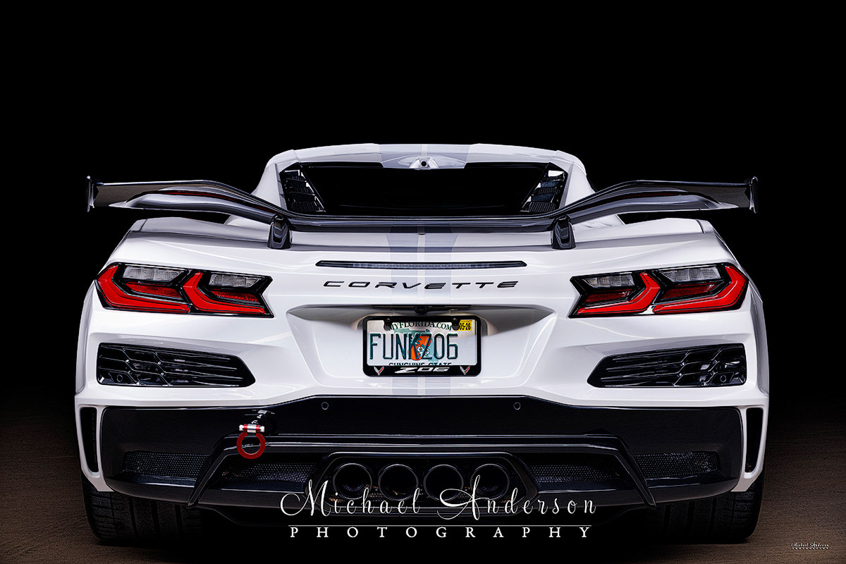 The rear end of a white 2023 70th Anniversary Z06 all setup and ready to be light painted.