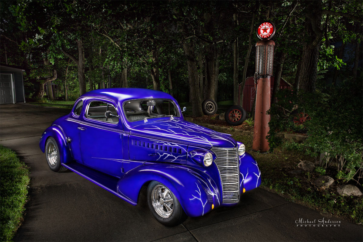 A beautiful light painting of a 1938 Chevy Coupe with hand-painted lightning bolts!