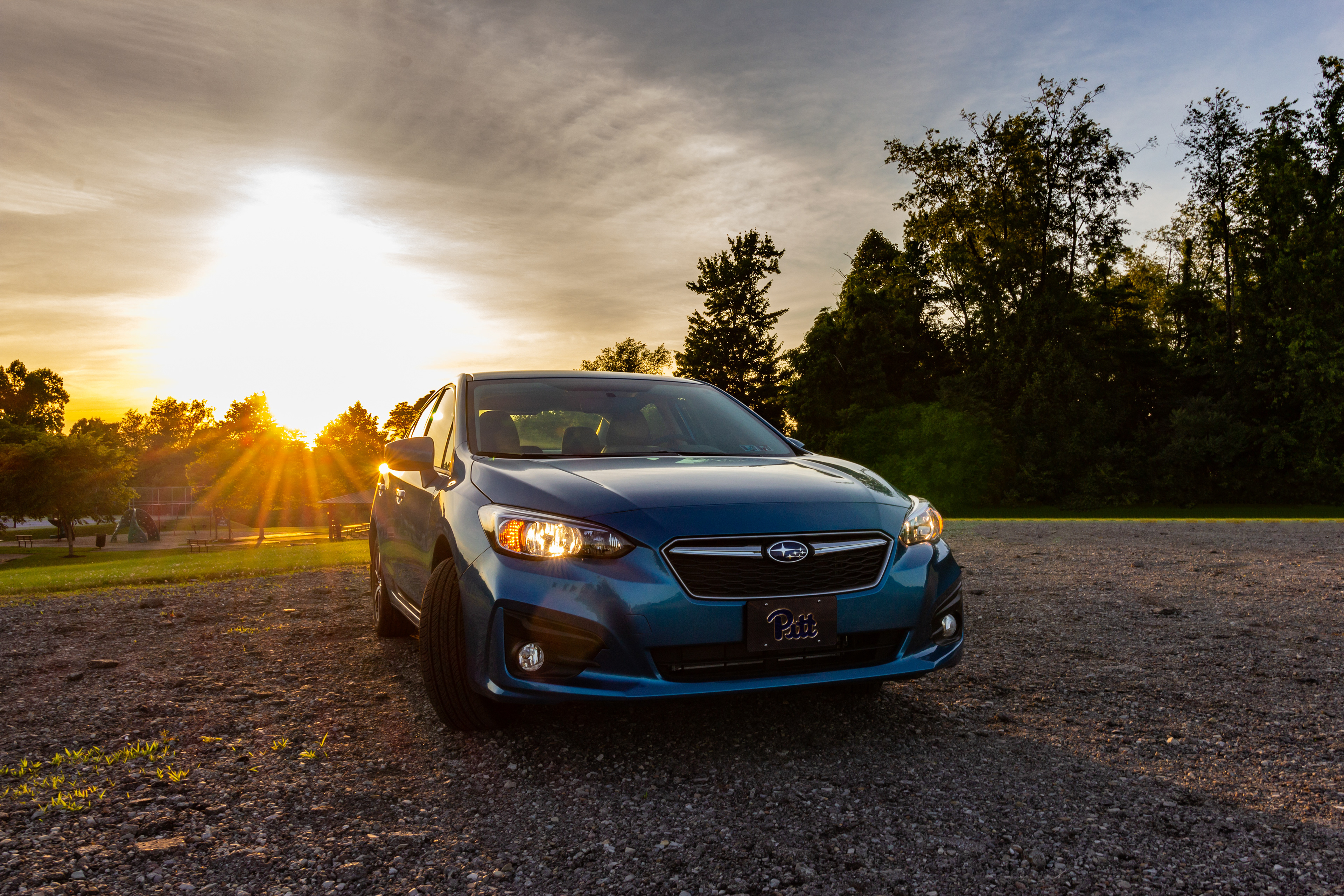 The sun sets on a new car