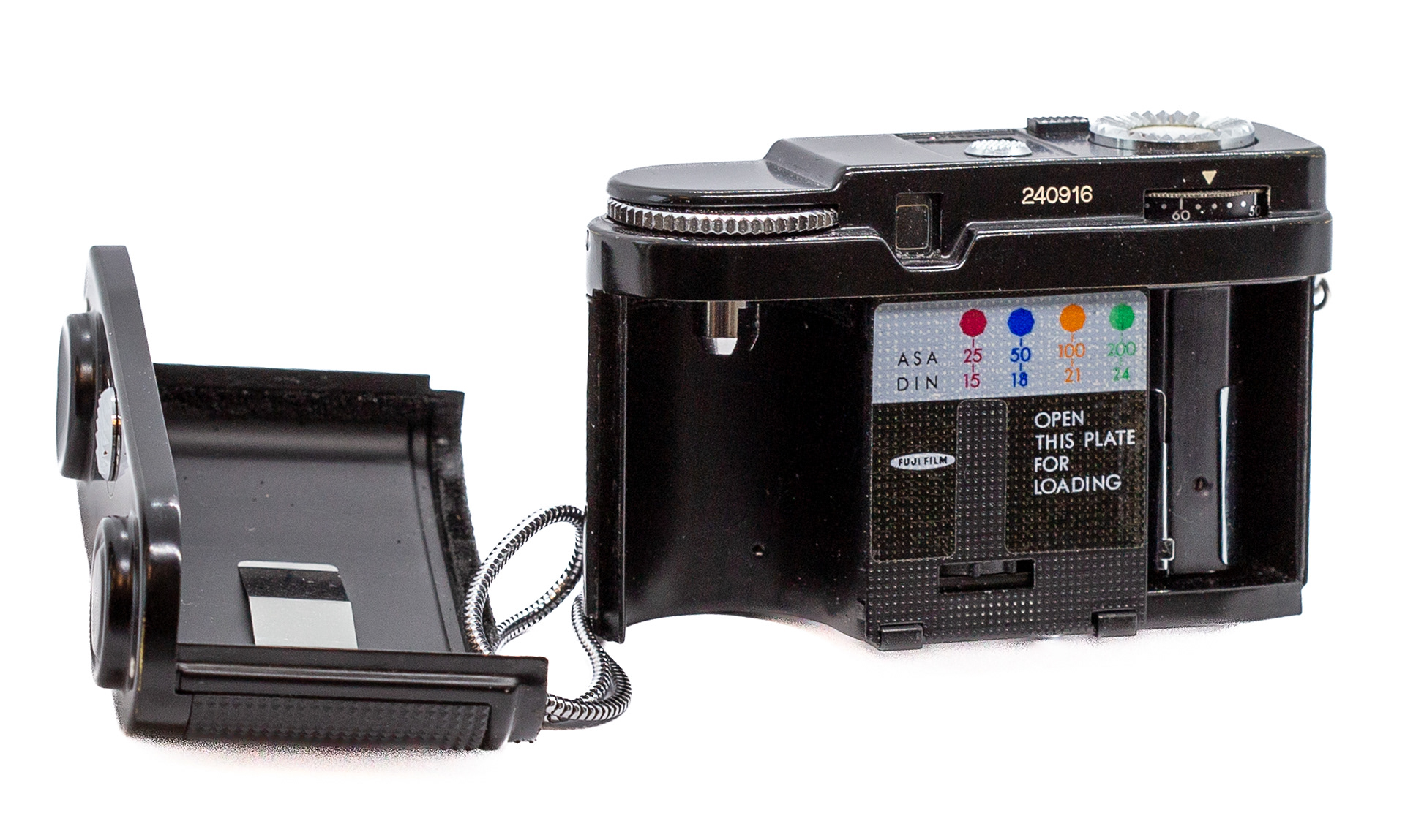 Fujica Mini z otwartą pokrywą. Widoczne opisy kryształków czułości- © 2026 Tomasz Ryś