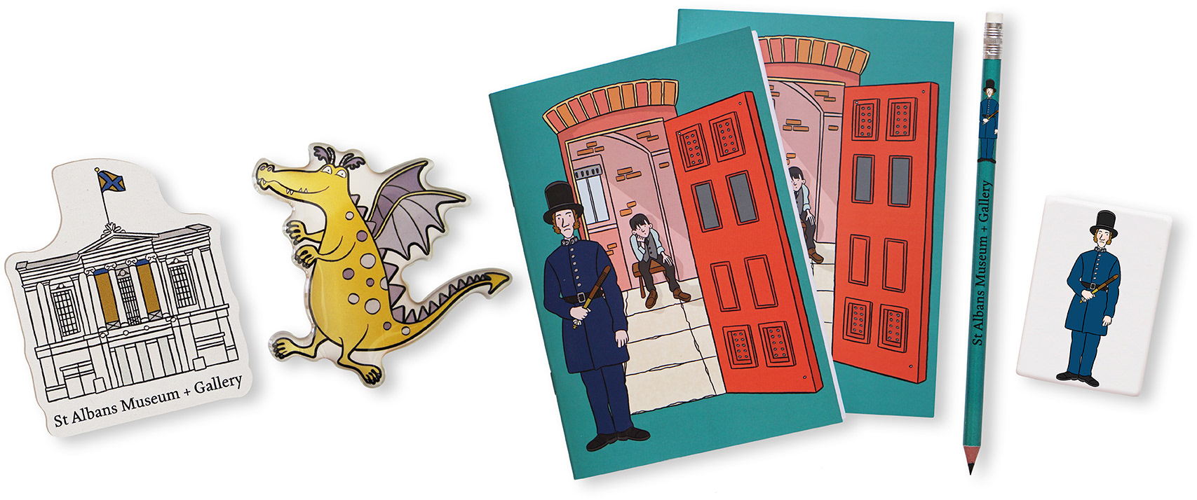A line of gift shop merchandise including, Historic building fridge magnet for St Albans Museum and Gallery , Ilbert the Dragon fridge magnet for Pontefract Castle, Notebook, pencil and erasure for St Albans Museum and Gallery