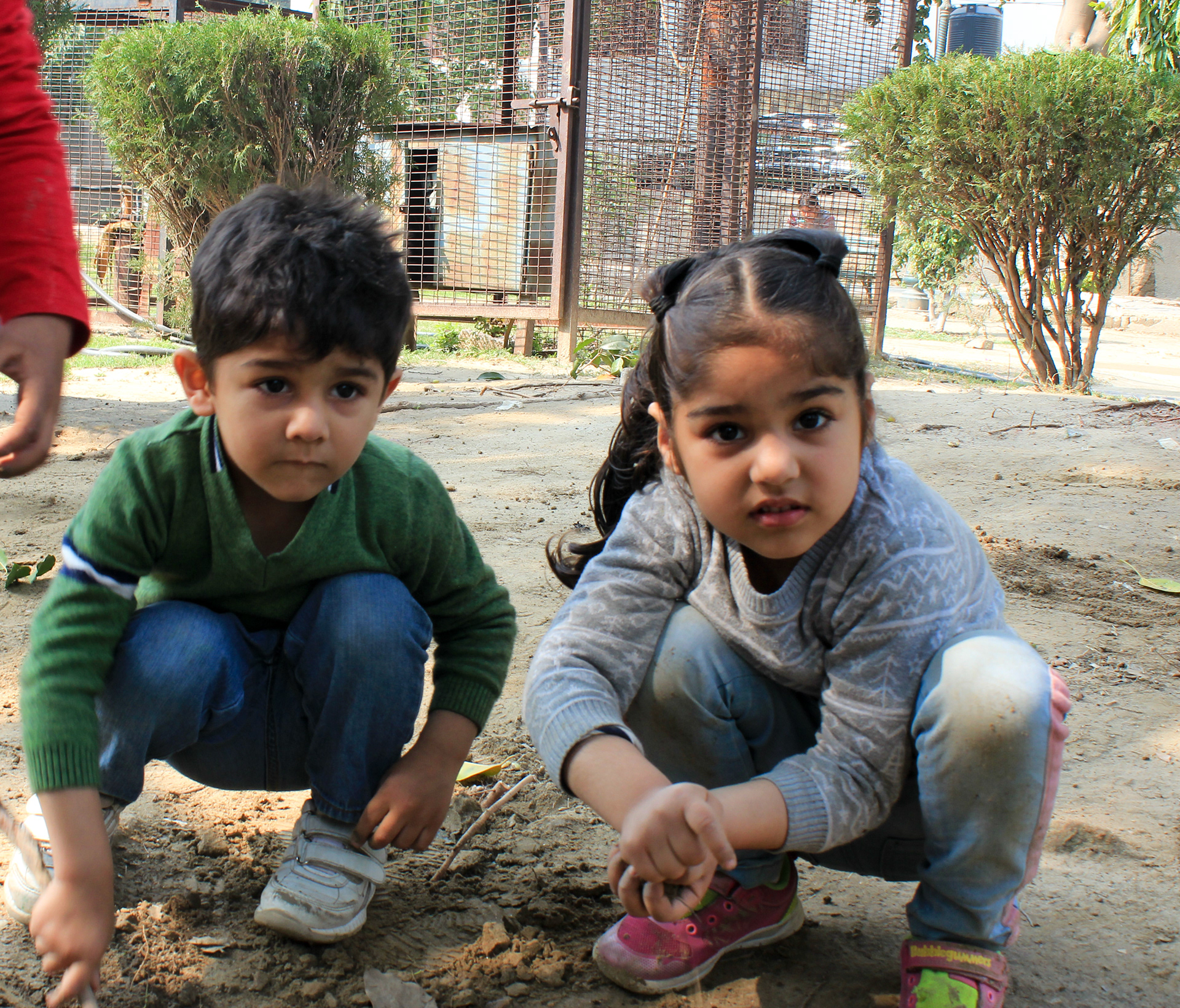 Inaayat and Vihaan come everyday at noon to play with their friends. Occassionally you can find them playing with dirt and mud in the Madhuban park neighborhood in New Delhi, India.