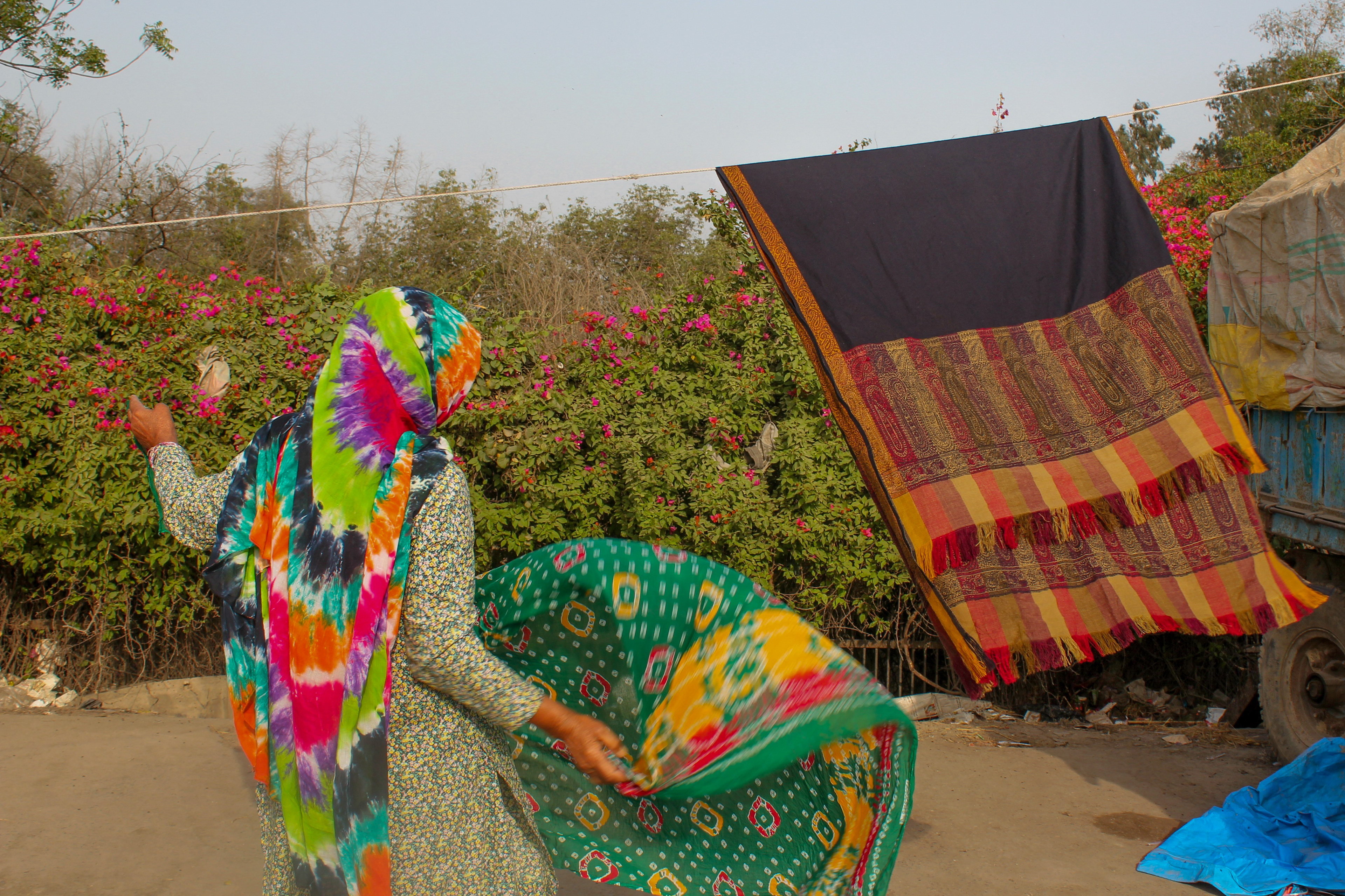 Clothes are washed and dried at the site.