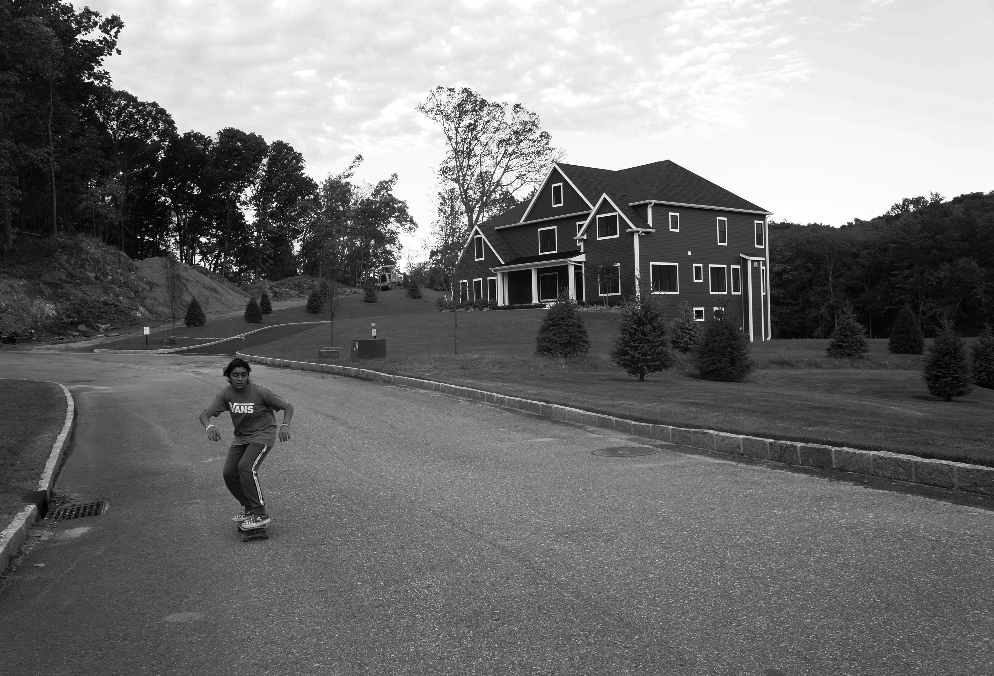 Briarcliff, NY, 18 Sept. Stop Motion photograph of Ashna, a 13 year old resident skateboarding in the neighbourhood