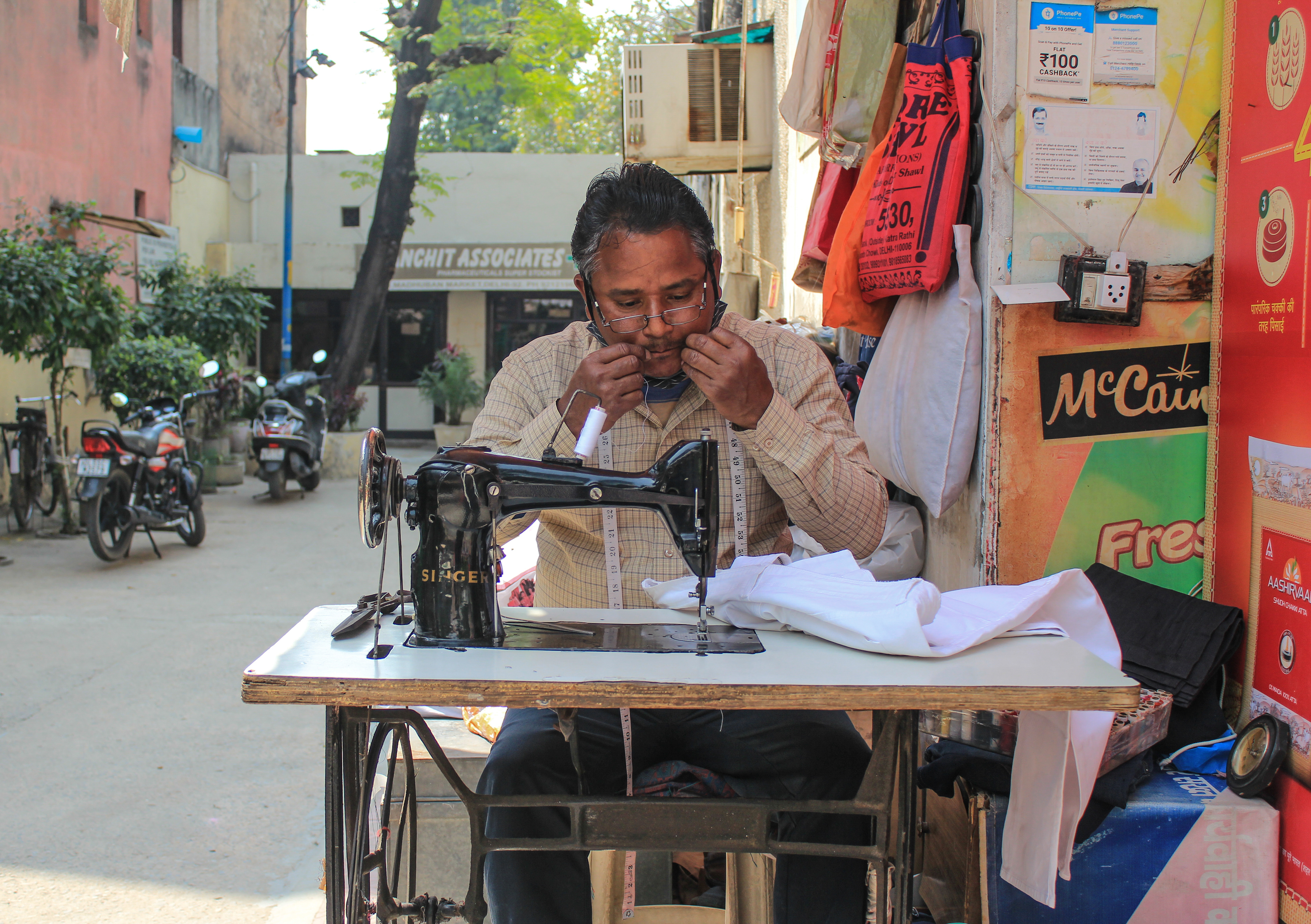 Virendra, 44, is working as a tailor since 1993. He says that stitching clothes as a profession is important for him since he is the breadwinner of his family. He also adds that the pandemic did not affect his business much.
