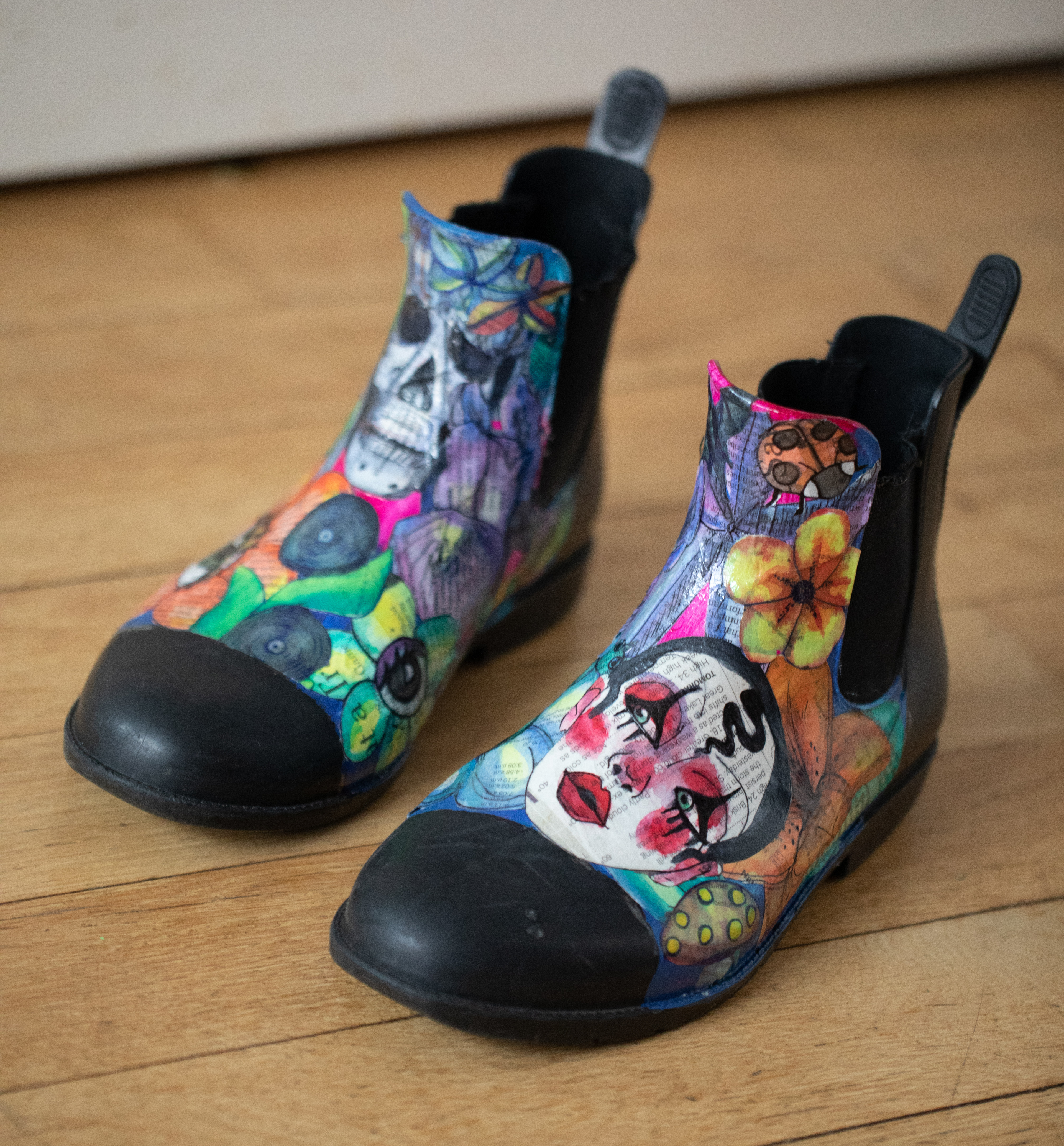 Watercolor, ink, newspaper on boots