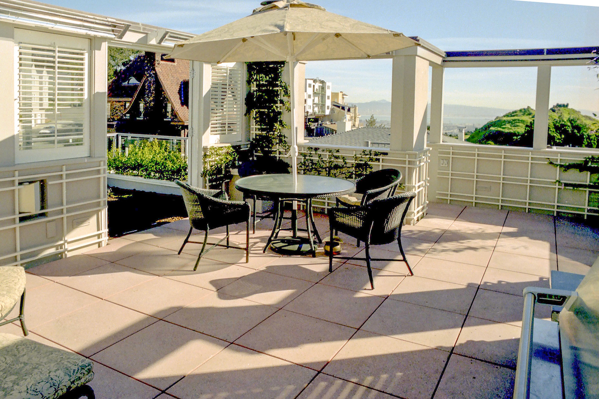 The floor is 24" sandblasted square concrete pavers.