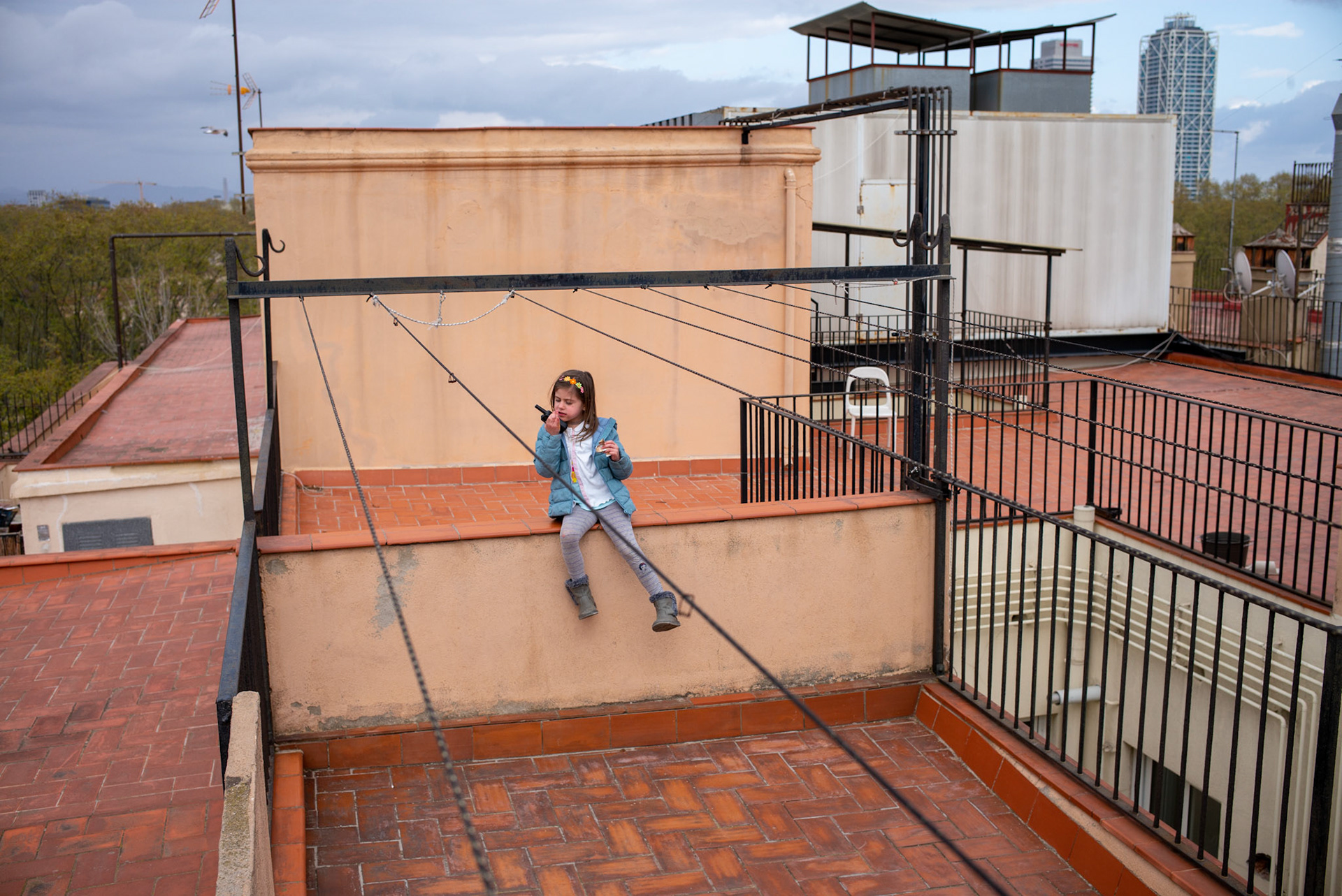 Sophie goes to the roof of the building of her apartment in Barcelona to enjoy a bit of the sun, and play while the whole country is in mandatory lockdown due to the Covid-19 crisis. She managed to make a girlfriend who was also using the walkie-talkie.
