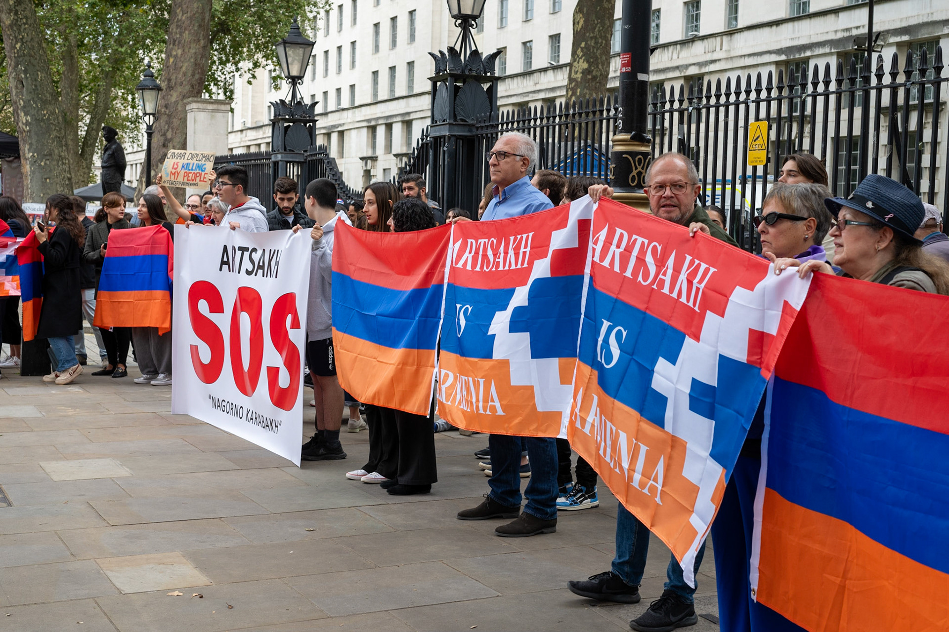 On September 30, 2023, at Downing St./EU Delegation Office, U.K., The United Committee of Armenian Organisation (ACCC) and the Diocese of the Armenian Church in the United Kingdom and Ireland gathered to denounce ethnic cleansing in the Republic of Artsakh (Nagorno-Karabakh). Bishop Hovakim Marukyan (not pictured) of the Diocese and representatives from the Armenian National Committee (ANC) were present. The event occurred amid President Samwel Shrahramanyan's call to dissolve the Republic by January 1, 2024, a move met with skepticism about its authenticity, given concerns of possible coercion. Azerbaijan had declared complete control over the enclave.