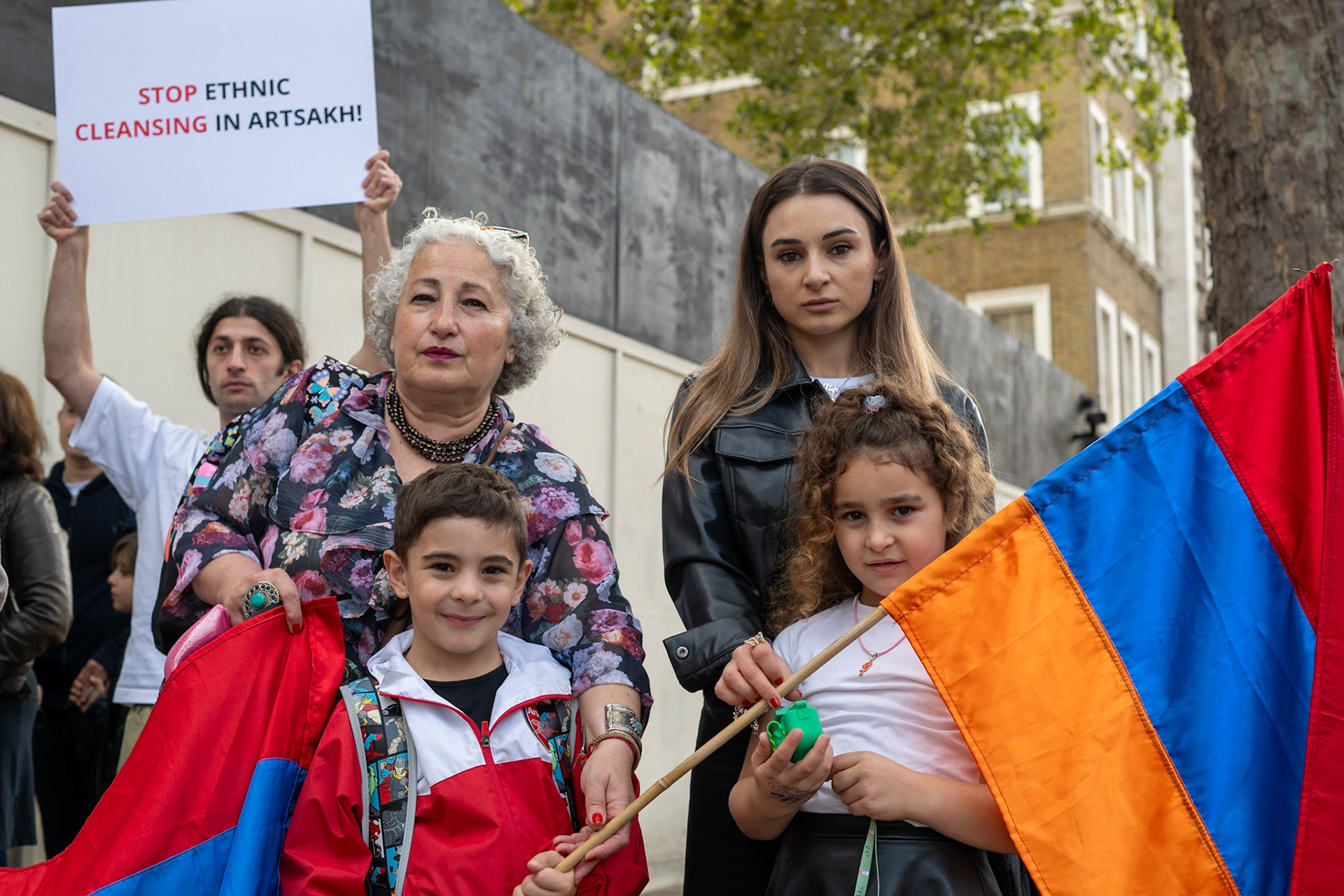 On September 30, 2023, at Downing St./EU Delegation Office, U.K., The United Committee of Armenian Organisation (ACCC) and the Diocese of the Armenian Church in the United Kingdom and Ireland gathered to denounce ethnic cleansing in the Republic of Artsakh (Nagorno-Karabakh). Bishop Hovakim Marukyan (not pictured) of the Diocese and representatives from the Armenian National Committee (ANC) were present. Larissa (pictured, surname provided) spoke emtionally about her upbringing in Baku, living in Ukraine and now in the U.K. The event occurred amid President Samwel Shrahramanyan's call to dissolve the Republic by January 1, 2024, a move met with skepticism about its authenticity, given concerns of possible coercion. Azerbaijan had declared complete control over the enclave.