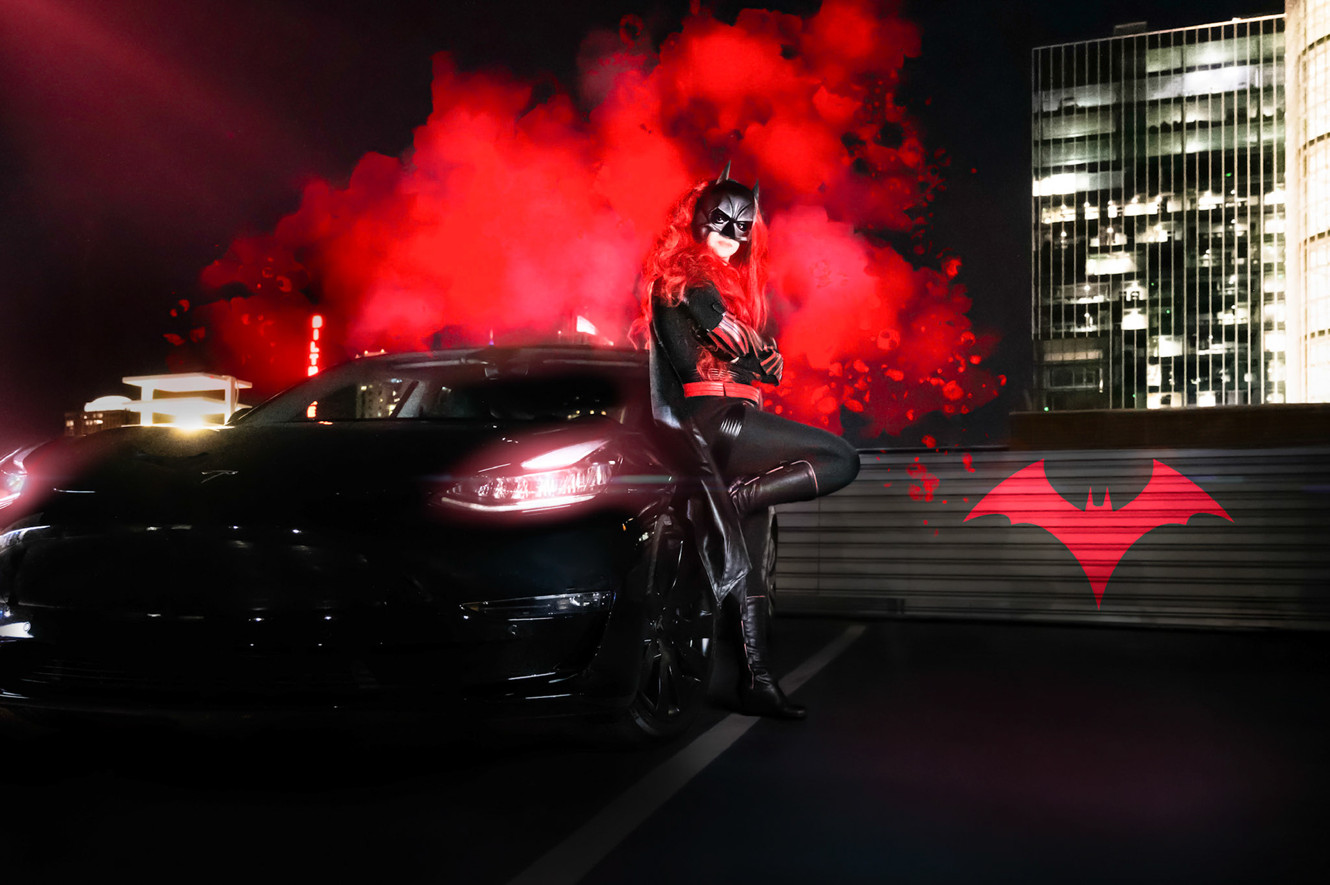 Batwoman and her Tesla Batmobile
