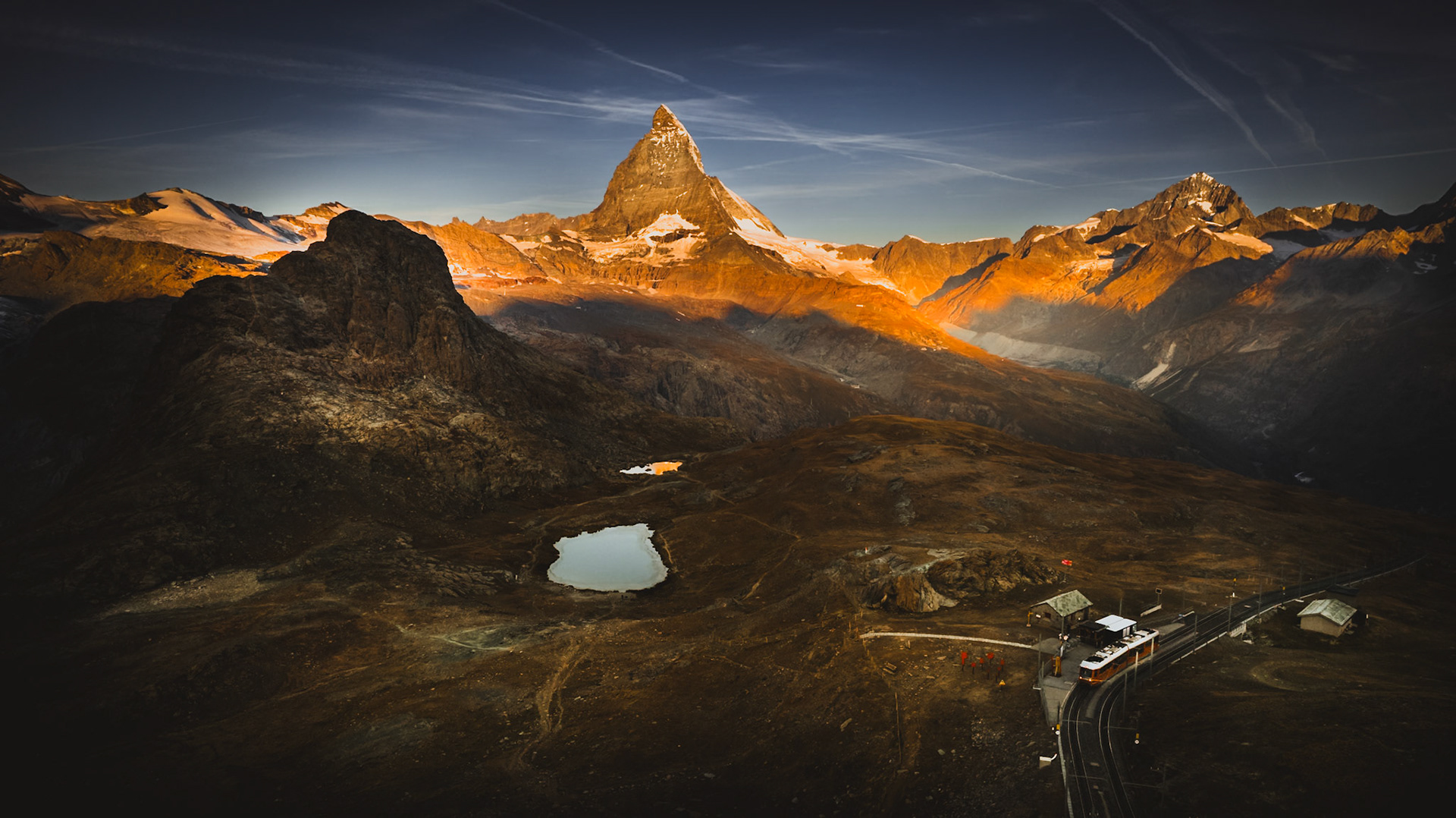 Riffelsee is an alpine lake above the town of Zermatt in the canton of Valais, Switzerland. It lies below the Riffelhorn at an elevation of 2757 m.