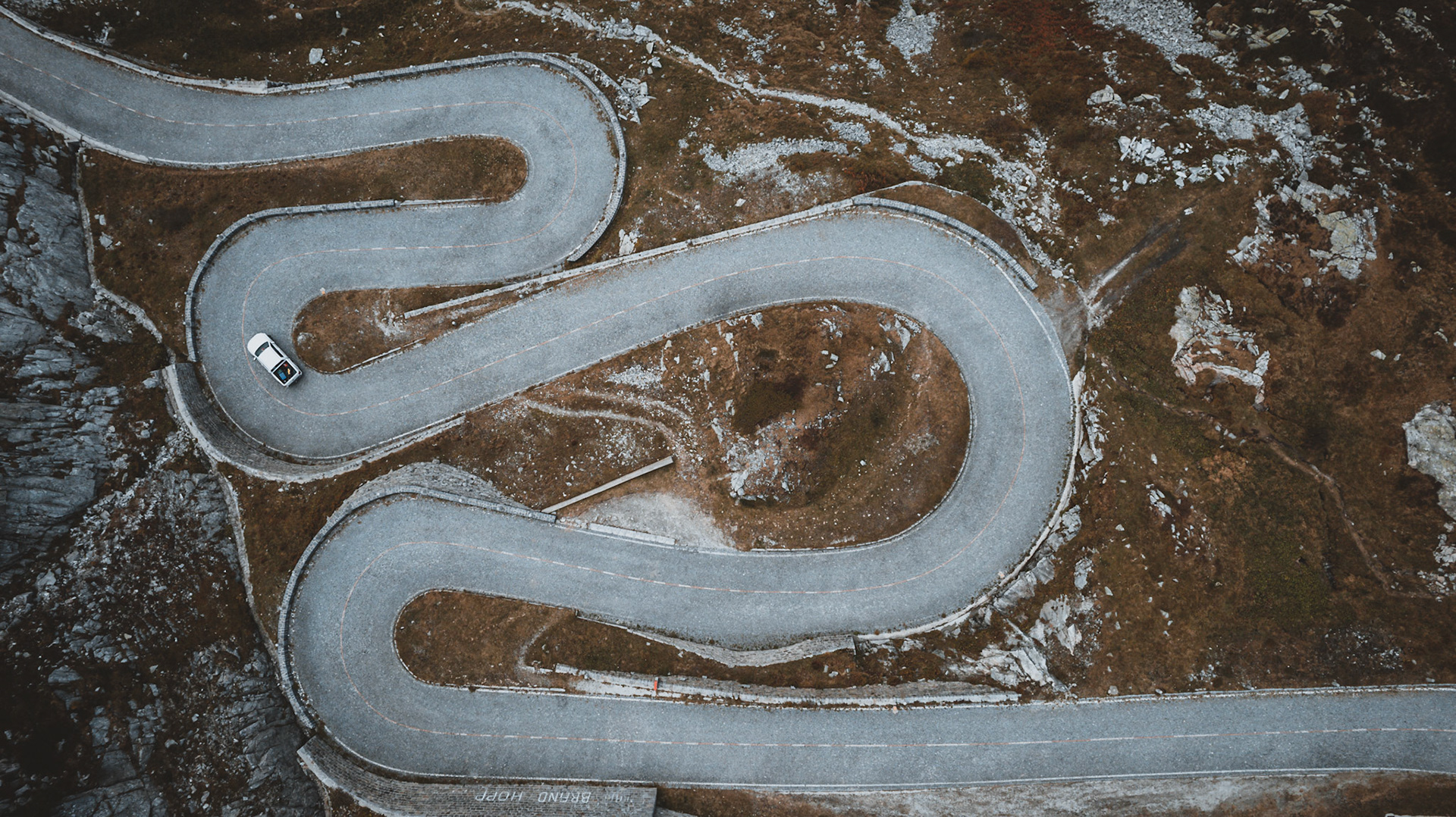Tremola at the Old Gotthard Pass Road, Canton of Ticino, Switzerland. The St. Gotthard Pass is a mountain pass in the Alps at 2,106 m traversing the Saint-Gotthard Massif and connecting northern and southern Switzerland.