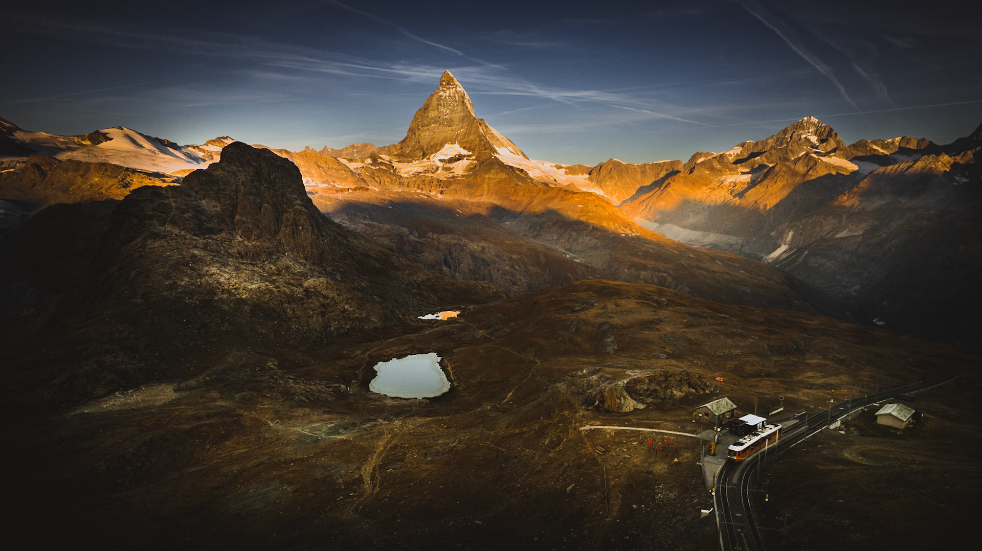 Riffelsee is an alpine lake above the town of Zermatt in the canton of Valais, Switzerland. It lies below the Riffelhorn at an elevation of 2757 m.