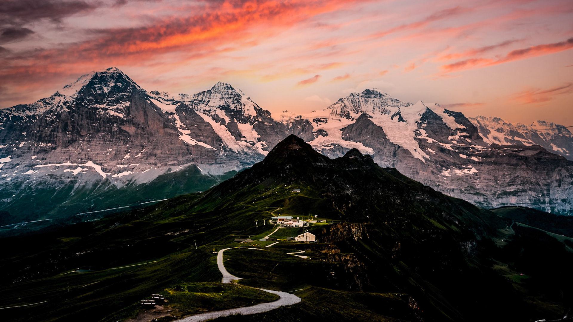 The Jungfrau at 4,158 meters is one of the main summits of the Bernese Alps, located between the northern canton of Bern and the southern canton of Valais. Together with the Eiger and Mönch, the Jungfrau forms a massive wall of mountains, one of the most distinctive sights of the Swiss Alps.