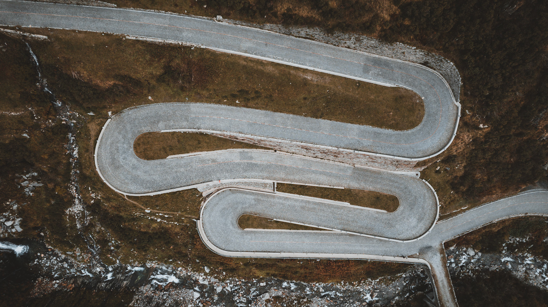 Tremola at the Old Gotthard Pass Road, Canton of Ticino, Switzerland.. The St. Gotthard Pass is a mountain pass in the Alps at 2,106 m traversing the Saint-Gotthard Massif and connecting northern and southern Switzerland.