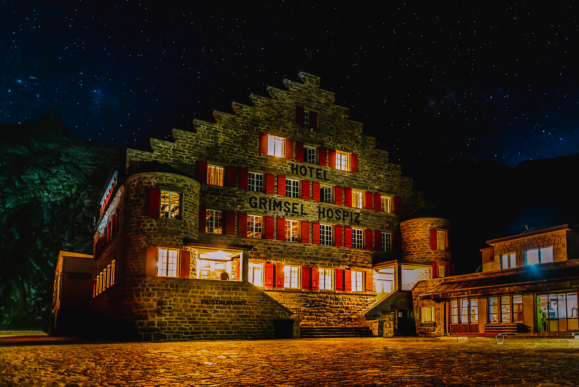 The Grimsel Hospice is located at the Grimsel Pass, a mountain pass in Switzerland, crossing the Bernese Alps at an elevation of 2,164 metres.
