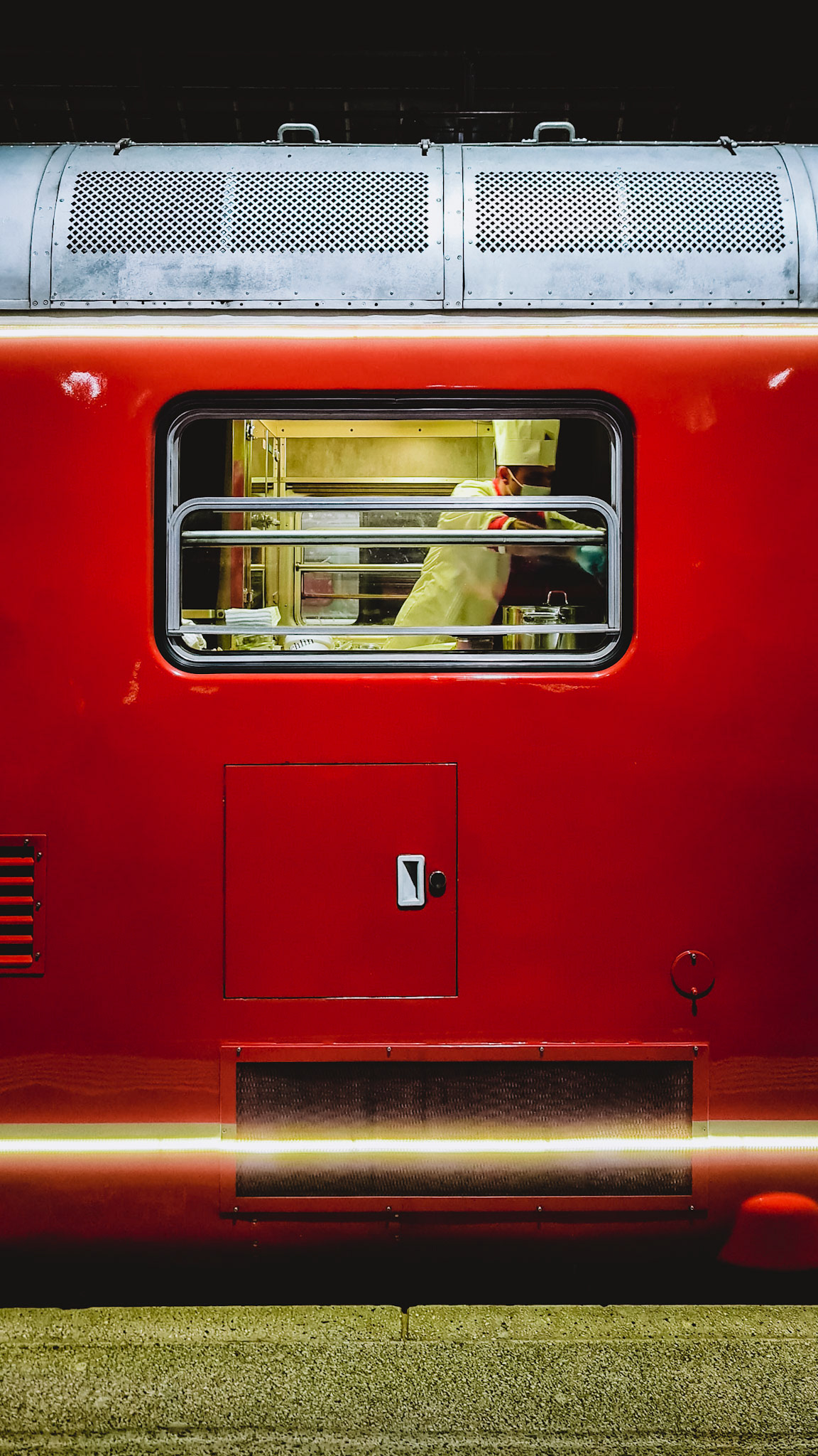 A chef in a historic train
