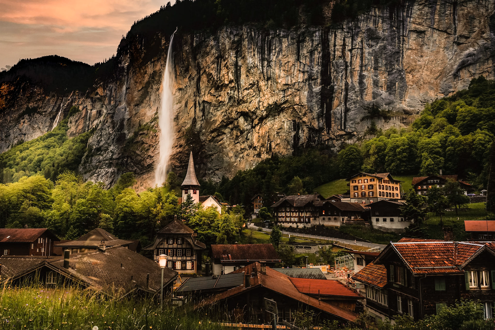 Lauterbrunnen, a village in the canton of Bern in Switzerland. The Staubbach Falls, located just west of Lauterbrunnen, drop 297 metres from a hanging valley that ends in overhanging cliffs above the Weisse Lütschine. A visit by Johann Wolfgang von Goethe in 1779 provided the inspiration for his poem "Gesang der Geister über den Wassern".