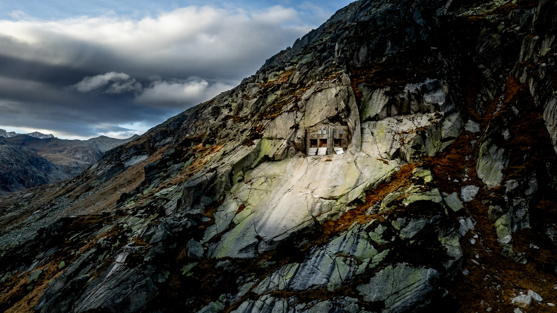 The Fort Sasso da Pigna at 2,400 metres on the Gotthard Pass was built during the early part of World War II, becoming operational in 1943. The fort consists of an eastern battery overlooking the Leventina valley and a western battery overlooking the Bedretto valley and the main pass.
