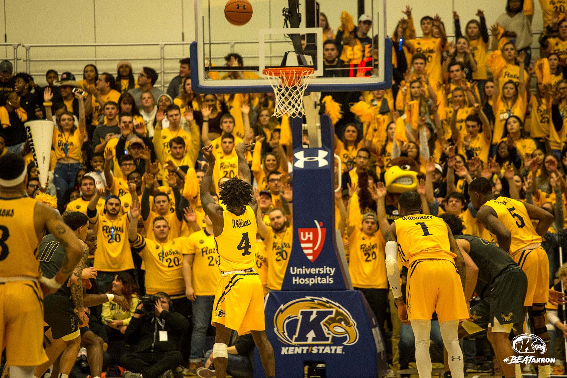 The Kent State Student Section displays their replica uniform t-shirts during the final moments of the 2020 "Gold Out" Game