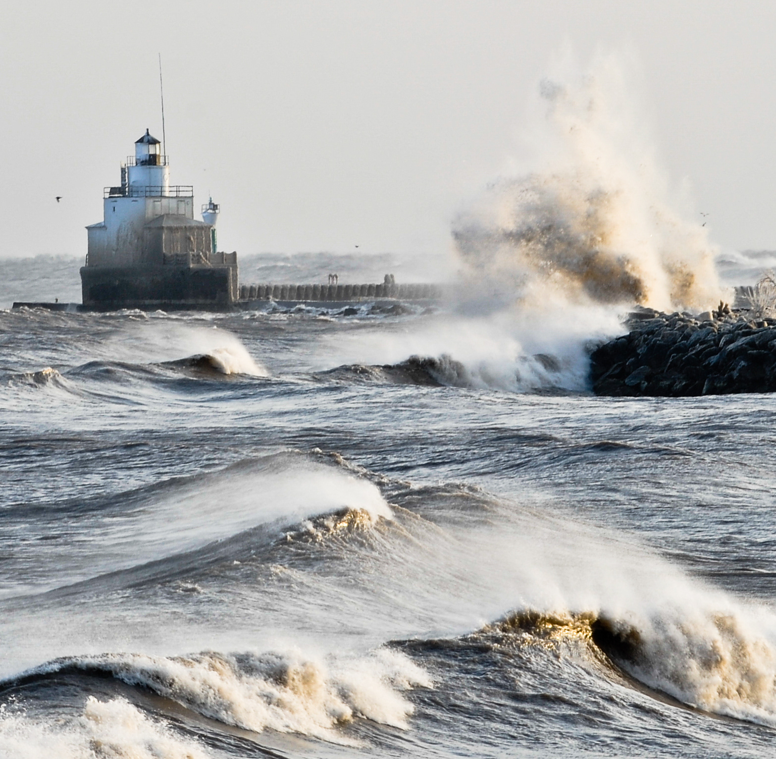 Waves break on the shores of Lake Michigan on Sunday in Manitowoc. High winds brought low wind chills and snowdrifts to Manitowoc County. Doug Sundin/HTR December 12, 2010 Manitowoc. Printed in the Herald Times Reporter on 12/13/2010.