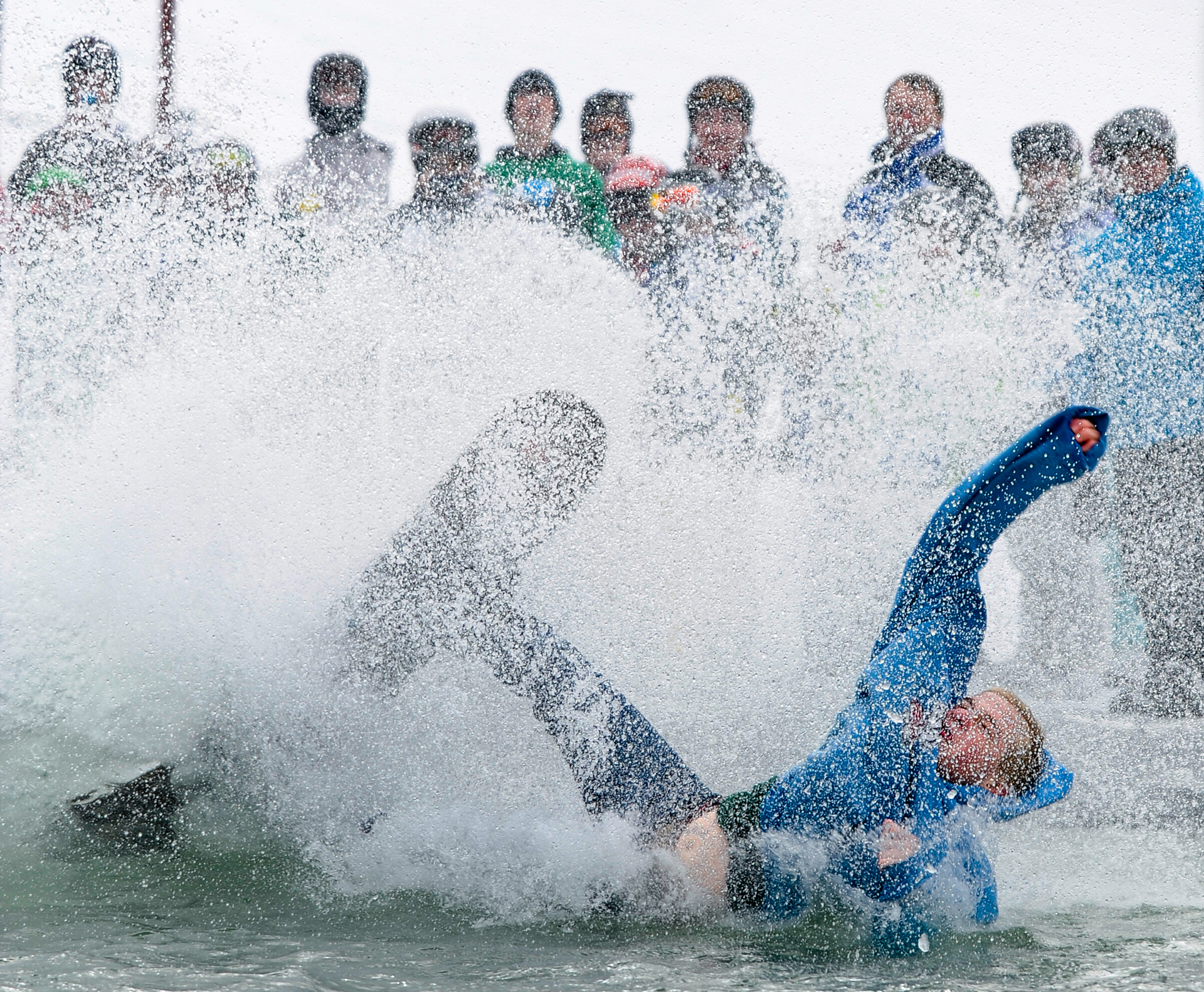 Jacob Vogel wipes out in the slush cup during the Spring Bash on March 12, 2011 at the Hidden Valley Ski Area in Maribel. Doug Sundin/HTR March 12, 2011 Maribel. Published on htrnews.com on 03/12/2011.