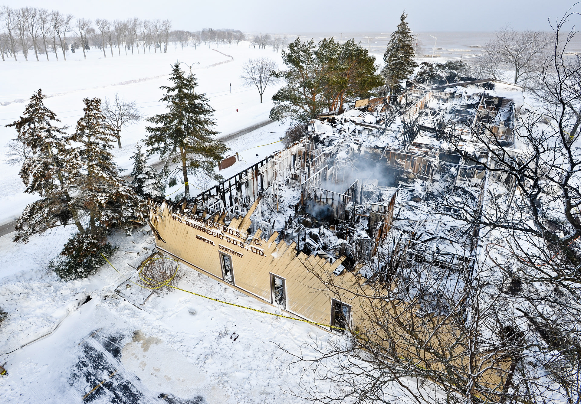 A fire Saturday night destroyed an office building at Waldo Boulevard and Maritime Drive in Manitowoc. Doug Sundin/HTR December 12, 2010 Manitowoc. Printed in the Herald Times Reporter on 12/13/2010.