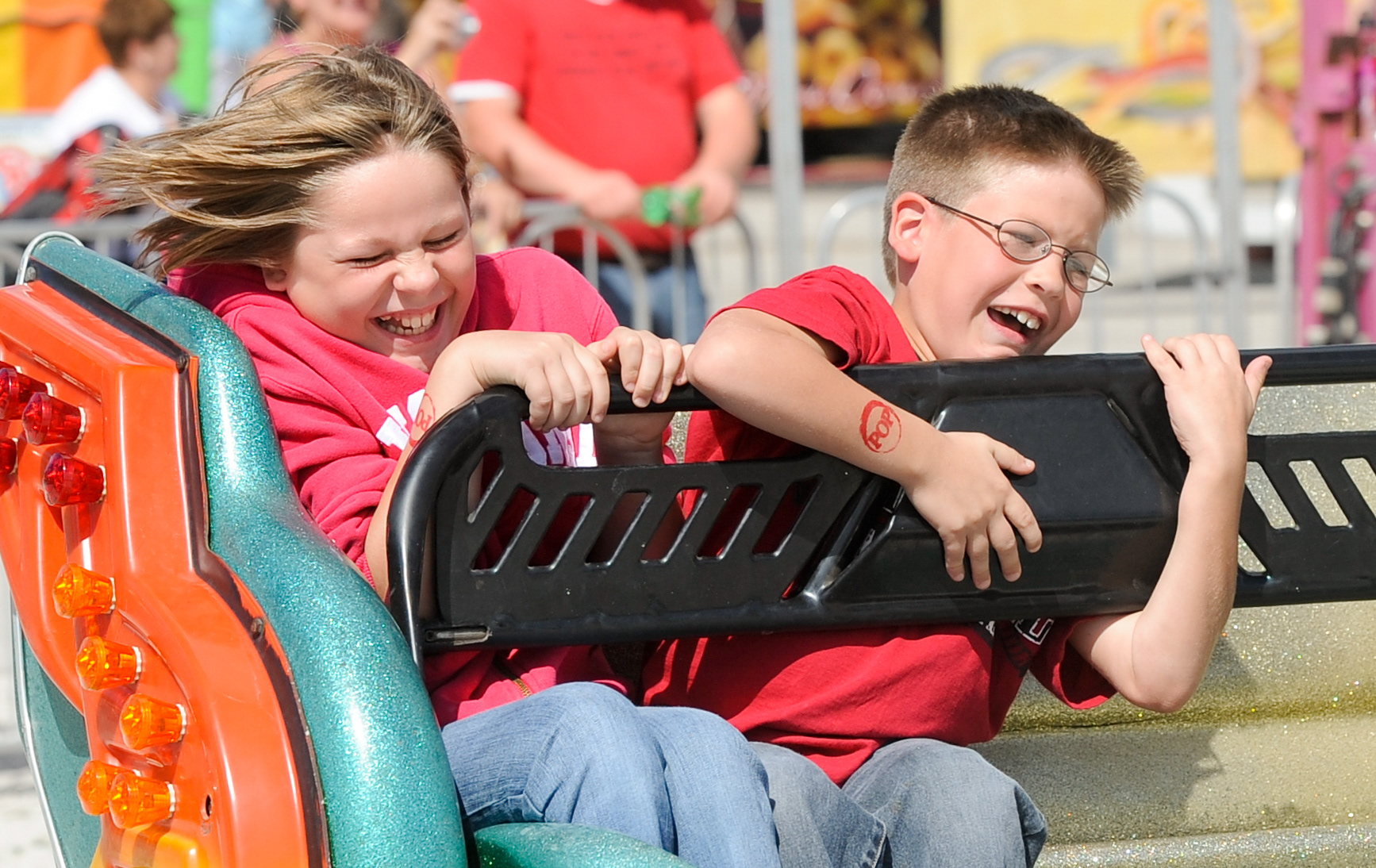 Becky Wagner Engelbrecht, 10, of Branch and her brother Aren, 7, ride the Sizzler Thursday at the Manitowoc County Fair. Doug Sundin/HTR August 26, 2010 Manitowoc. Published in the Lakeshore Chronicle on 09/01/2010. Second place in the NPPA's September 2010 Monthly Clip Contest in Region 5.