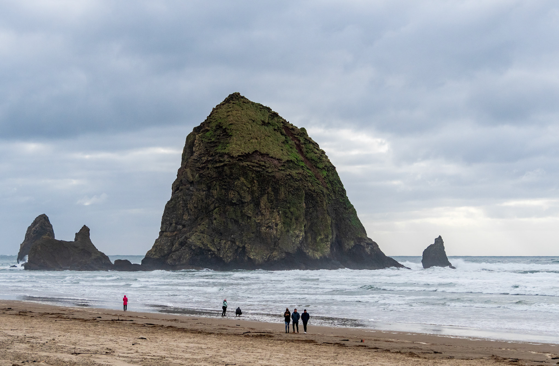 Haystack Rock is a 235 ft sea stack in Cannon Beach, Oregon.