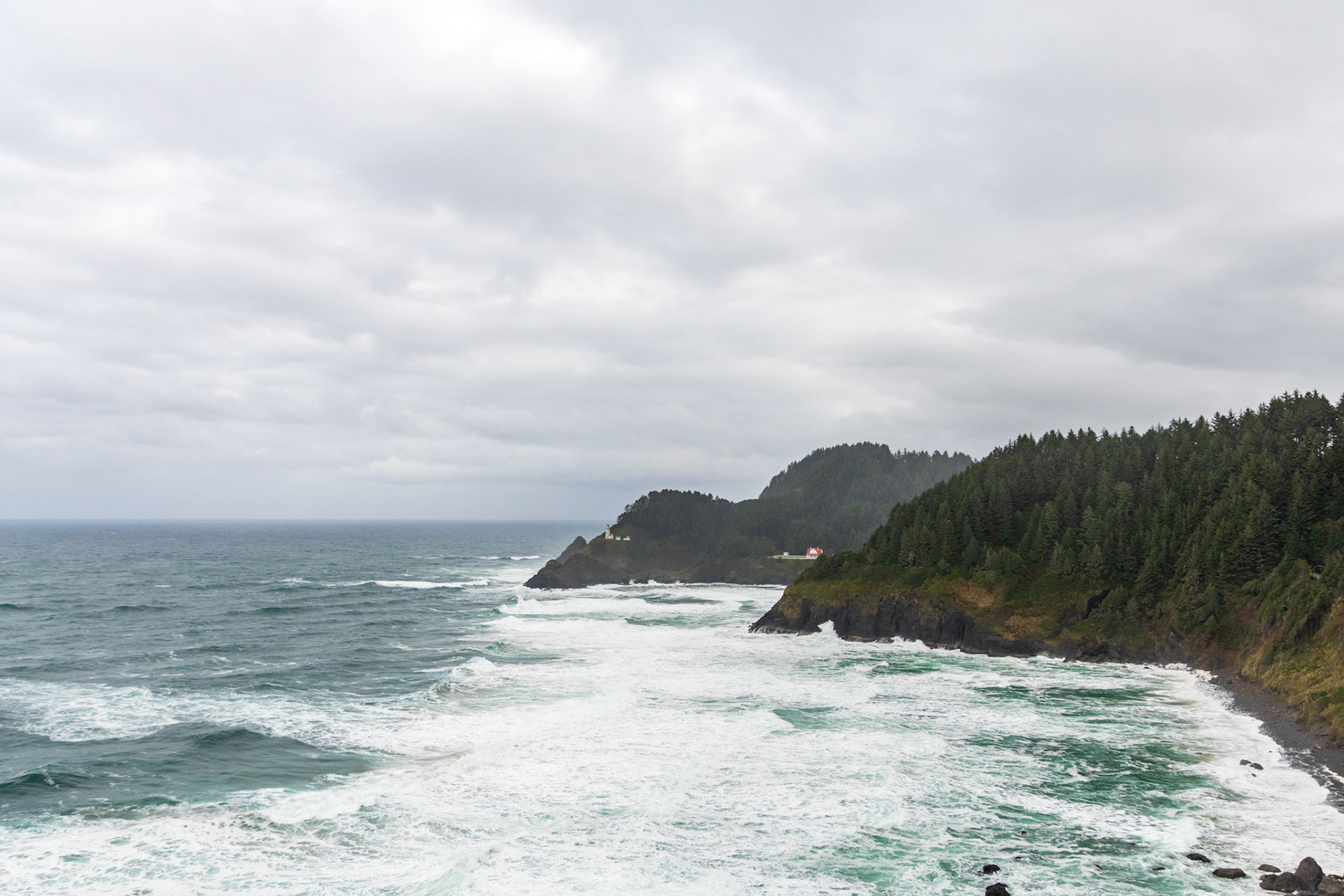 Looking north along the Oregon US 101 highway to the Heceta Head Lighthouse