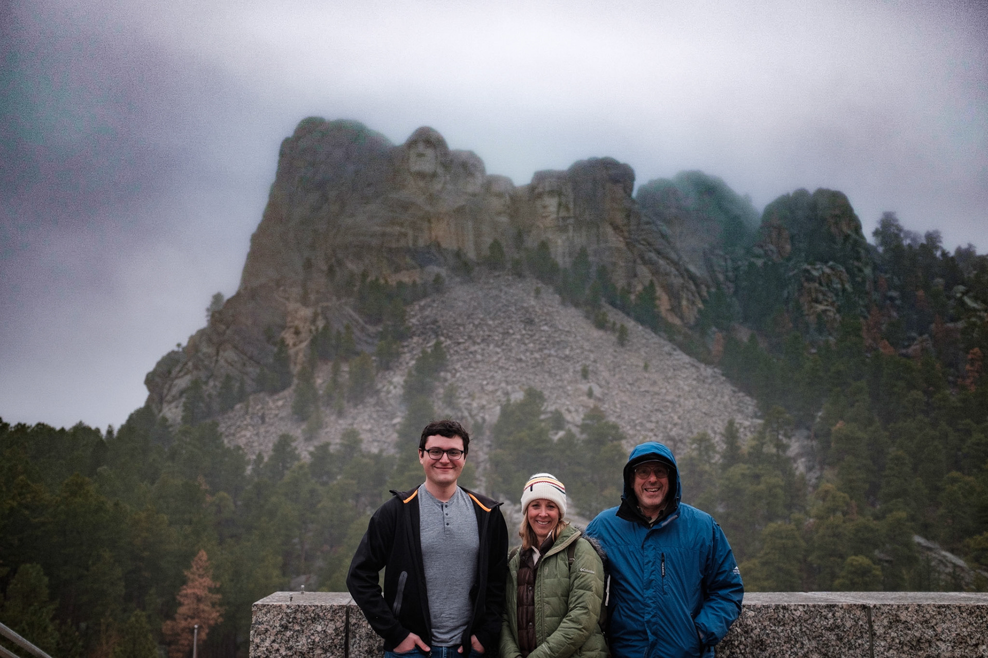 Rushmore in the Rain. Matthew, Lauren, Me.