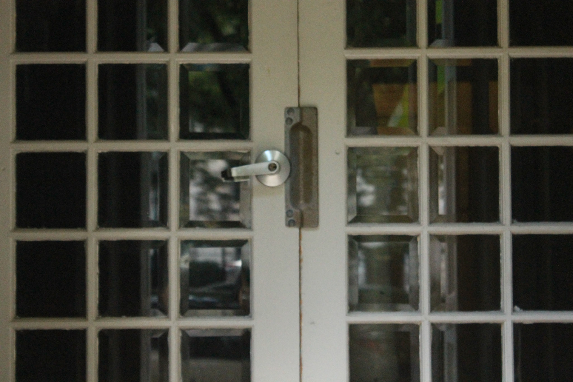A glass doorway to a historic home on East Mount Vernon Place. Baltimore, Maryland; Thursday, September 8, 2022.