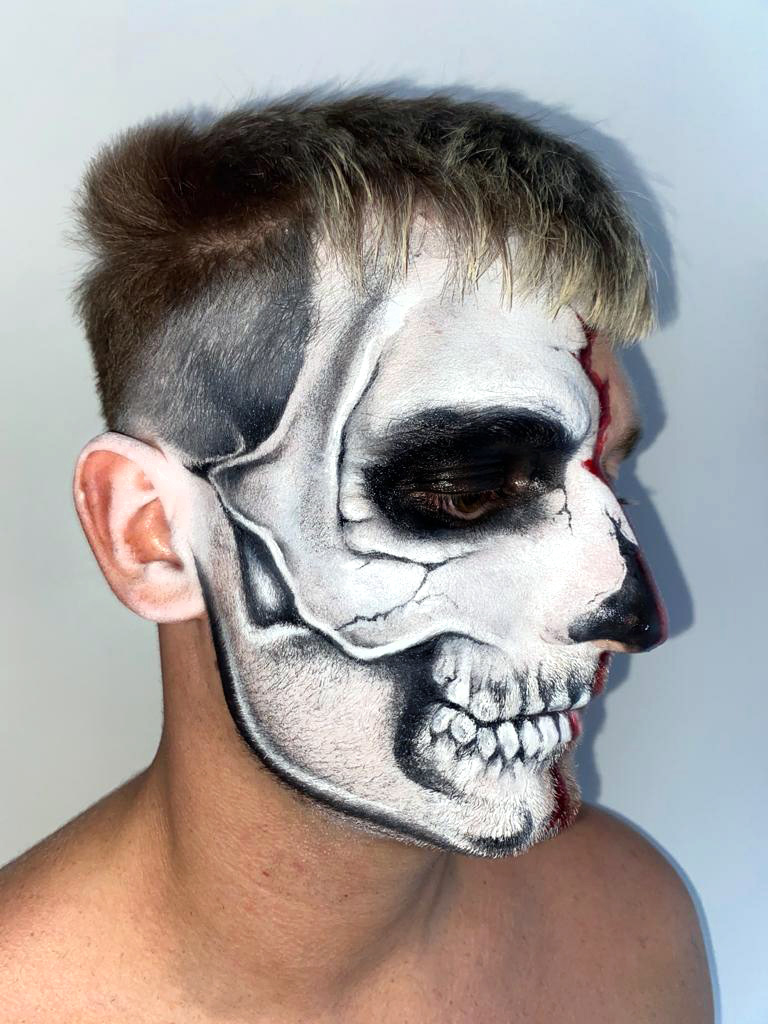 Detailed half skull face halloween look