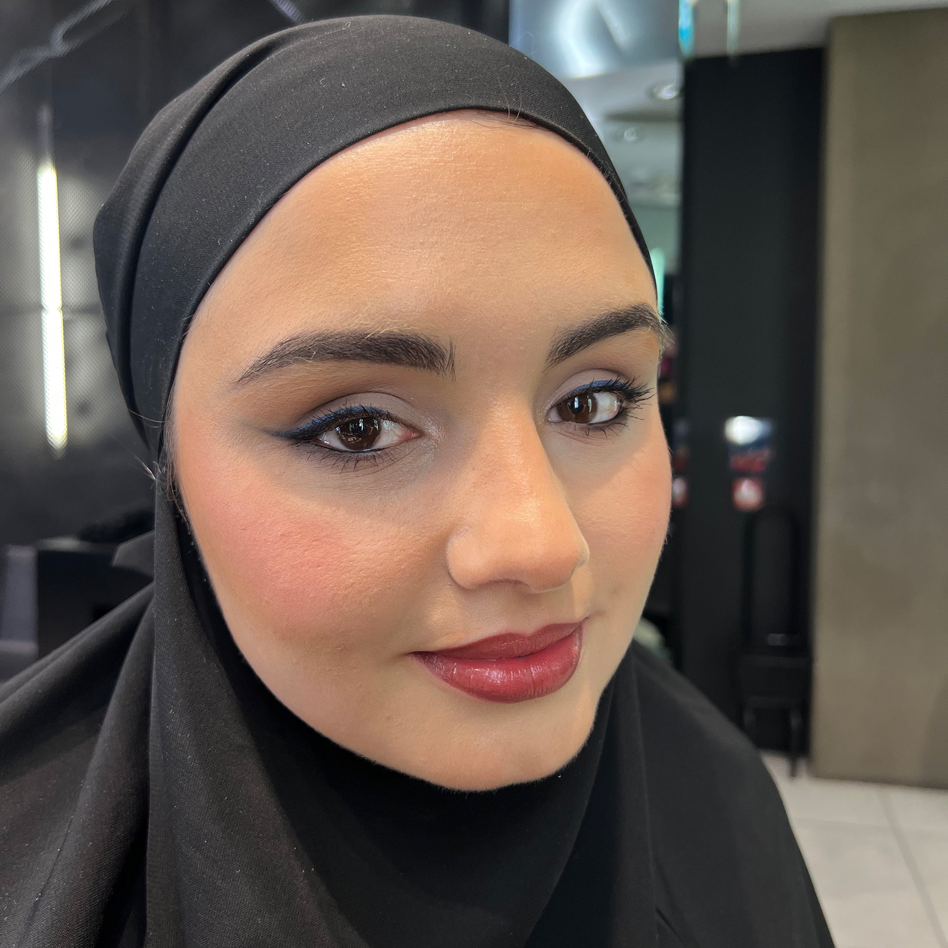 black and reflects blue winged liner