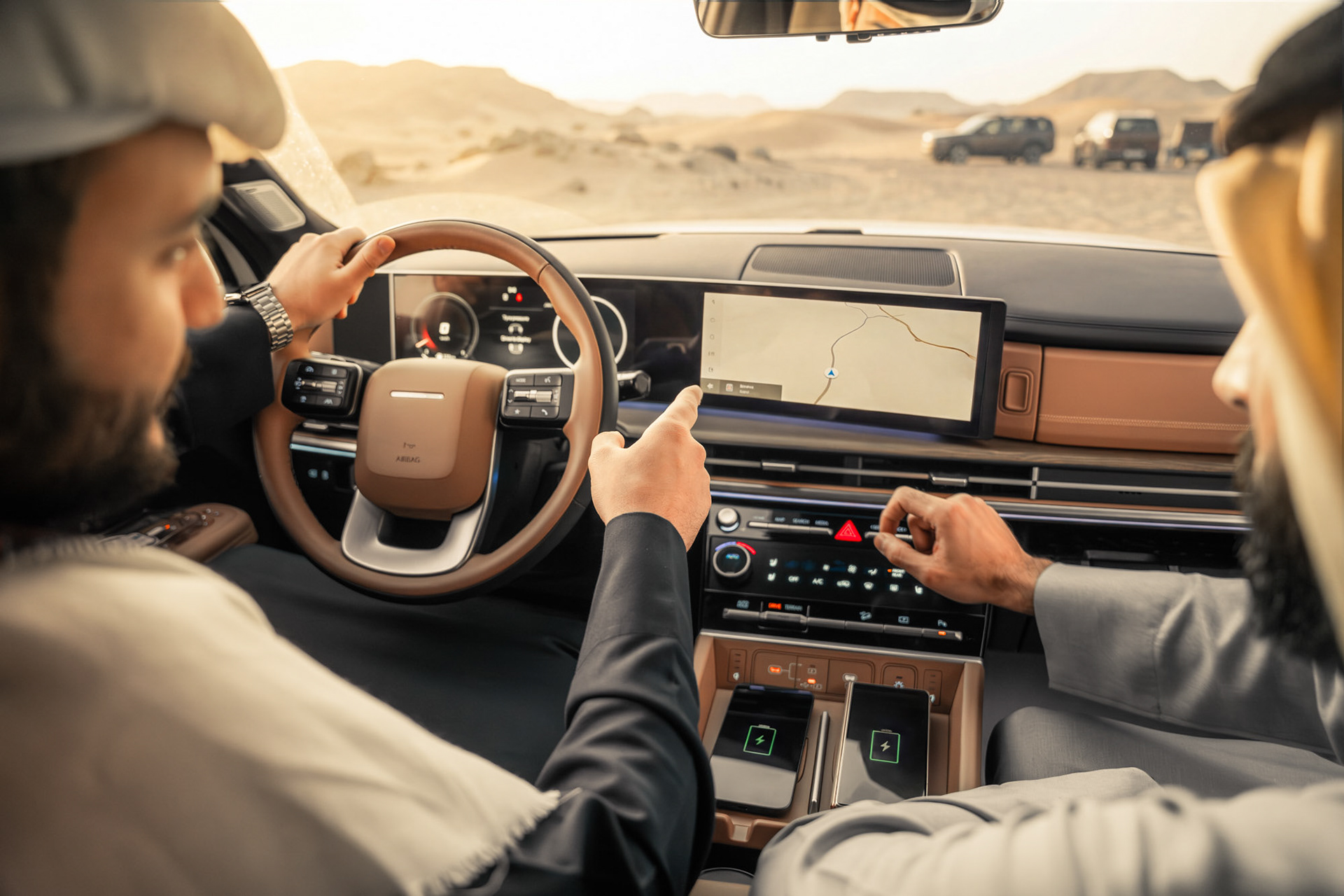 HYUNDAI SANTA FE interior dashboard and infotainment screen with navigation map, desert convoy visible through the windshield, Bahrain — Shift Mootark