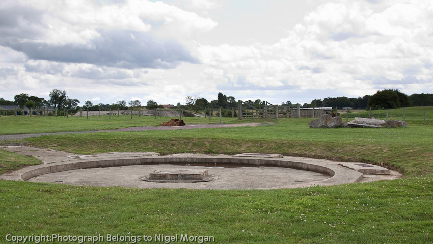 The Merville Battery defences were formidable. A 400-yard anti-tank ditch, 15ft wide by 10ft deep, wound its way around the west and north-western sides. Two belts of barbed wire surrounded the whole Battery, the outer not being too fearsome, but the inner was around 6ft high by 10ft deep. Between these belts was a minefield, while other mines had been sown in various possible approach routes around the Battery. The garrison was estimated to contain 160 men, manning 15 to 20 weapons pits, each containing 4 to 5 machine guns and possibly three 20mm anti-aircraft guns.
