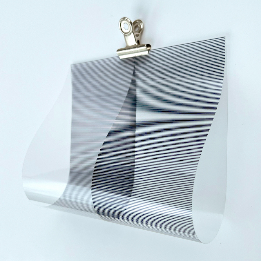 295 lines, 25th May, fineliner on a 30x15 cm plastic sheet, folded and clipped.